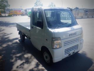 2004 Suzuki Carry Flat Deck Mini Truck Right Hand Drive Manual, gasoline engine, 2 door, manual, air conditioning, AM/FM radio, white exterior, grey interior, cloth.  Wheelbase is 7 feet 9 inch , Box size is approximately 6 feet 6 inches long by 4 feet 9 inches wide and the side is 11 inches tall. $7,320.00 plus $375 processing fee, $7,695.00 total payment obligation before taxes.  Listing report, warranty, contract commitment cancellation fee, financing available on approved credit (some limitations and exceptions may apply). All above specifications and information is considered to be accurate but is not guaranteed and no opinion or advice is given as to whether this item should be purchased. We do not allow test drives due to theft, fraud and acts of vandalism. Instead we provide the following benefits: Complimentary Warranty (with options to extend), Limited Money Back Satisfaction Guarantee on Fully Completed Contracts, Contract Commitment Cancellation, and an Open-Ended Sell-Back Option. Ask seller for details or call 604-522-REPO(7376) to confirm listing availability.