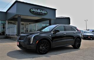 <p style=text-align: center; line-height: 1;><strong><span style=font-family: arial, helvetica, sans-serif; font-size: 18pt;>*2023 CADILLAC XT4 FWD 4DR LUXURY*</span></strong></p><p style=text-align: center; line-height: 1;><em><strong><span style=font-family: arial, helvetica, sans-serif; font-size: 18pt;>POWERTRAIN & MECHANICAL</span></strong></em></p><p style=text-align: center; line-height: 1;><strong><span style=font-family: arial, helvetica, sans-serif; font-size: 14pt;>(LSY) ECOTEC 2.0L TURBOCHARGED VVT 4-CYLINDER ENGINE.</span></strong></p><p style=text-align: center; line-height: 1;><span style=font-size: 12pt;><span style=font-family: arial, helvetica, sans-serif;><em>FEATURING;</em></span><span style=font-size: 12pt; font-family: arial, helvetica, sans-serif;><em> </em>TriPower Engine Technology.</span></span></p><p style=text-align: center; line-height: 1;><span style=font-size: 12pt;><span style=font-family: arial, helvetica, sans-serif;>1 - High Valve-Lift For Maximum Power.</span></span></p><p style=text-align: center; line-height: 1;><span style=font-size: 12pt;><span style=font-family: arial, helvetica, sans-serif;>2 - Low Valve-Lift For A Greater Balance Of Power & Efficiency.</span></span></p><p style=text-align: center; line-height: 1;> </p><p style=text-align: center; line-height: 1;><span style=font-size: 12pt;><span style=font-family: arial, helvetica, sans-serif;>3 - Active Fuel Management (AFM); Disables Two Of The Cylinders Under Light Load Conditions.</span></span></p><p style=text-align: center; line-height: 1;><span style=font-family: arial, helvetica, sans-serif; font-size: 14pt;><strong>9-SPEED AUTOMATIC TRANSMISSION.</strong></span></p><p style=text-align: center; line-height: 1;><span style=font-family: arial, helvetica, sans-serif; font-size: 14pt;><span style=font-size: 12pt;>w/ STEERING WHEEL-MOUNTED PADDLE-SHIFTERS.</span></span></p><p style=text-align: center; line-height: 1;><span style=font-family: arial, helvetica, sans-serif; font-size: 14pt;><strong>FRONT-WHEEL DRIVE.</strong></span></p><p style=text-align: center; line-height: 1;><span style=font-family: arial, helvetica, sans-serif; font-size: 14pt;><span style=font-size: 12pt;>w/ 3.47 FINAL DRIVE-AXLE RATIO.</span></span></p><p style=text-align: center; line-height: 1;><strong><span style=font-family: arial, helvetica, sans-serif; font-size: 14pt;>20 GLOSS BLACK ALUMINUM WHEELS.</span></strong></p><p style=text-align: center; line-height: 1;><em><strong><span style=font-family: arial, helvetica, sans-serif; font-size: 18pt;>LUXURY PREFERRED EQUIPMENT GROUP</span></strong></em></p><p style=text-align: center; line-height: 1;><span style=font-family: arial, helvetica, sans-serif;><em><strong><span style=font-size: 18pt;>ONYX LITE</span></strong></em><strong><span style=font-size: 18pt;> PACKAGE</span></strong></span></p><p style=text-align: center; line-height: 1;><span style=font-family: arial, helvetica, sans-serif; font-size: 14pt;>Wireless Apple CarPlay® / Android Auto™, Monochromatic Cadillac Emblem, Black Surround Grille w/ Black Mesh, 20 Gloss-Black Wheels, </span><span style=font-family: arial, helvetica, sans-serif; font-size: 18.6667px;>Black Name Plate,</span><span style=font-family: arial, helvetica, sans-serif; font-size: 18.6667px;> </span><span style=font-family: arial, helvetica, sans-serif; font-size: 14pt;>Gloss-Black XT4 Nameplate.</span></p><p style=text-align: center; line-height: 1;><em><strong><span style=font-family: arial, helvetica, sans-serif; font-size: 18pt;>SAFETY / FUNCTIONAL FEATURES</span></strong></em></p><p style=text-align: center; line-height: 1;><span style=font-family: arial, helvetica, sans-serif;><span style=font-size: 18.6667px;>Lane Change Alert w/ Side Blind-Zone Alert, Rear Cross-Traffic Alert, Front Pedestrian Braking, Forward Collision Alert, Automatic Emergency Braking, Driver’s Safety Alert Seat, HD Rear Vision Camera, Rear Park Assist, Wi-Fi® Hotspot Capable, Remote Vehicle Start, Tire Inflation Kit, Cruise Control, Rear Seat Reminder, Teen Driver, HD Radio</span></span><span style=font-family: arial, helvetica, sans-serif; font-size: 18.6667px;>™</span><span style=font-size: 18.6667px; font-family: arial, helvetica, sans-serif;>, SiriusXM</span><span style=font-family: arial, helvetica, sans-serif; font-size: 18.6667px;>®</span><span style=font-size: 18.6667px; font-family: arial, helvetica, sans-serif;>, OnStar</span><span style=font-family: arial, helvetica, sans-serif; font-size: 18.6667px;>®</span><span style=font-family: arial, helvetica, sans-serif; font-size: 18.6667px;> & Cadillac Connected Services Capable, Universal Home Remote, Tire Pressure Monitor.</span></p><p style=text-align: center; line-height: 1;><em><strong><span style=font-family: arial, helvetica, sans-serif; font-size: 18pt;>INTERIOR FEATURES</span></strong></em></p><p style=text-align: center; line-height: 1;><span style=font-family: arial, helvetica, sans-serif;><span style=font-size: 18.6667px;>Jet Black Leather Seating, Heated Front Seats, Heated Rear Seats (Outboard Positions), 8-Way Power Driver & Front Passenger Seats, Virtual Cockpit System, Dual-Zone Automatic Climate Control, 4.2 Reconfigurable Colour Driver Information Centre, Premium Carpeted Front & Rear Floor Mats, Heated Steering Wheel, Leather Wrapped Steering Wheel, Speedometer w/ Kilometers/Miles.</span></span></p><p style=text-align: center; line-height: 1;><strong><em><span style=font-family: arial, helvetica, sans-serif; font-size: 18pt;>EXTERIOR FEATURES</span></em></strong></p><p style=text-align: center; line-height: 1;><span style=font-family: arial, helvetica, sans-serif; font-size: 18.6667px;> </span><span style=font-family: arial, helvetica, sans-serif; font-size: 18.6667px;>Power Liftgate,</span><span style=font-family: arial, helvetica, sans-serif;><span style=font-size: 18.6667px;> Front License Plate Kit, Monochromatic Cadillac Emblem, 20” Gloss-Black Wheels, LED Headlamps, Black Name Plate, Gloss-Black XT4 Nameplate.</span></span></p><p style=text-align: center; line-height: 1;><em><strong><span style=font-family: arial, helvetica, sans-serif; font-size: 18pt;>*SPECIFICATIONS & FUEL ECONOMY*</span></strong></em></p><p style=text-align: center; line-height: 1;><em><span style=font-family: arial, helvetica, sans-serif; font-size: 14pt;>235 HORSEPOWER <span style=font-family: arial, helvetica, sans-serif;>@ 5000 RPM.</span></span></em></p><p style=text-align: center; line-height: 1;><em><span style=font-family: arial, helvetica, sans-serif; font-size: 14pt;><span style=font-family: arial, helvetica, sans-serif;>258 LB.-FT. OF TORQUE @ 1500-4000 RPM.</span></span></em></p><p style=text-align: center; line-height: 1;><em><span style=font-family: arial, helvetica, sans-serif; font-size: 14pt;>9.1 L/100 KM COMBINED.</span></em></p><p style=text-align: center; line-height: 1;> </p><p style=text-align: center; line-height: 1;><em><span style=font-family: arial, helvetica, sans-serif; font-size: 14pt;>7.8 L/100 KM HIGHWAY & 10.2 L/100 KM CITY.</span></em></p><p style=text-align: center; line-height: 1;><em><strong><span style=font-size: 18pt;><span style=font-family: arial, helvetica, sans-serif;>*FACTORY WARRANTY*</span></span></strong></em></p><p style=text-align: center; line-height: 1;><em><span style=font-family: arial, helvetica, sans-serif;><span style=font-size: 18.6667px;>Premium Care Maintenance - Canada: 19/09/2026 Or 80,012 Km.</span></span></em></p><p style=text-align: center; line-height: 1;><em><span style=font-family: arial, helvetica, sans-serif;><span style=font-size: 18.6667px;>New Vehicle Limited Warranty: 19/09/2026 80,012 Km.</span></span></em></p><p style=text-align: center; line-height: 1;><em><span style=font-family: arial, helvetica, sans-serif;><span style=font-size: 18.6667px;>Powertrain Limited Warranty: 19/09/2028 Or 110,012 Km.</span></span></em></p><p style=text-align: center; line-height: 1;><em><span style=font-family: arial, helvetica, sans-serif;><span style=font-size: 18.6667px;>Corrosion Limited Warranty: 19/09/2028 Or Unlimited Km.</span></span></em></p><p style=text-align: center; line-height: 1;><em><span style=font-family: arial, helvetica, sans-serif;><span style=font-size: 18.6667px;>Restraint System Limited Warranty: 19/09/2028 Or 120,012 Km.</span></span></em></p><p style=text-align: center; line-height: 1;><em><span style=font-family: arial, helvetica, sans-serif;><span style=font-size: 18.6667px;>Emission Select Component Warranty: 19/09/2030 Or 130,012 Km.</span></span></em></p><p style=text-align: center; line-height: 1;><span style=font-size: 14pt;><strong><span style=font-family: arial, helvetica, sans-serif;>Here at Lanoue/Amfar Sales, Service & Leasing in Tilbury, we take pride in providing the public with a wide variety of High-Quality Pre-owned Vehicles. We recondition and certify our vehicles to a level of excellence that exceeds the Status Quo. We treat our Customers like family and provide the highest level of service from Start to Finish. If you’d like a smooth & stress-free car shopping experience, give one of our Sales Associates a call at 1-844-682-3325 to help you find your next NEW-TO-YOU vehicle!</span></strong></span></p><p style=text-align: center; line-height: 1;><span style=font-size: 14pt;><strong><span style=font-family: arial, helvetica, sans-serif;>Although we try to take great care in being accurate with the information in this listing, from time to time, errors occur. The vehicle is priced as it is physically equipped. Minor variances will not effect pricing. Please verify the vehicle is As Expected when you visit. Thank You!</span></strong></span></p>