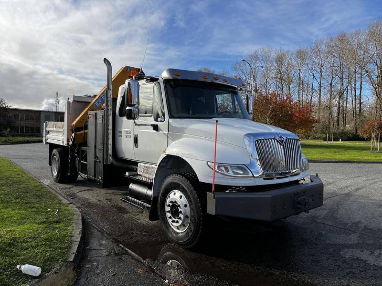 Used 2013 International 4300 DuraStar Dump Truck With Crane Air Brakes Diesel for sale in Burnaby, BC