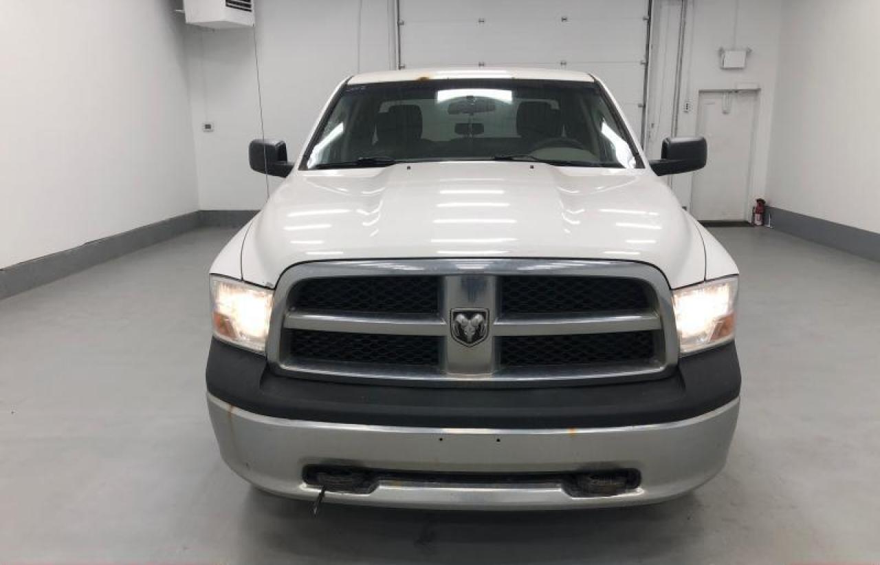 Used 2012 RAM 1500 4WD QUAD CAB 140.5