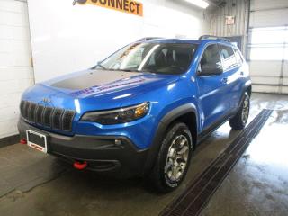<p>Getting into off-roading? or just looking for a nimble and capable 4WD SUV?</p><p>Do check out this pre-owned 2020 Jeep Cherokee Trail-hawk in its beautiful Hydro blue pearl color coat.</p><p>Safety features such as vehicle stability and traction control help the vehicle on both tarmac and dirt/snow terrains. Through the addition of the All-terrain Firestone - Destination tires you receive aggressive traction on back roads and a comfortable quiet ride on the highway.</p><p>The low mileage on this SUV indicates that it has a lot of life left. Jeep vehicles in general are very modifiable with tons of mods available, therefore you can always personalize this Cherokee according to how you'd like it.&nbsp;</p><p>The 3.2L V6 in this SUV provides a lot of power to overcome obstacles that you may face during your adventures. Its fuel efficient over its competitors as well. The trunk area is large enough for your luggage while out camping or hanging out with the family. The leather seats with red stitching are visually appealing, and comfortable. Power Mirrors, Power Seats, Power Lumbar Support make sure the driver and passenger are satisfied completely.&nbsp;</p><p>The vehicle has been very well kept.&nbsp;Don't miss the opportunity to own this Jeep!&nbsp;</p><p>Visit Auto Connect Sales and take it for a spin!</p><p><br></p>