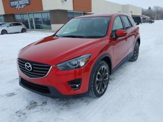 Come Finance this vehicle with us. Apply on our website stonebridgeauto.com<br><br><div>
2016 Mazda CX-5 GT with 94000km. 2.5L 4 cylinder AWD. Clean title and safetied. </div><div><br></div><div>Leather interior </div><div>Heated seats </div><div>Dual climate control </div><div>Blind spot monitoring </div><div>Navigation </div><div>Back up camera </div><div>Bluetooth </div><div>Sunroof </div><div><br></div><div>We take trades! Vehicle is for sale in Steinbach by STONE BRIDGE AUTO INC. Dealer #5000 we are a small business focused on customer satisfaction. Financing is available if needed. Text or call before coming to view and ask for sales.  </div>