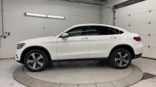 ONLY 10,000 KMS!! VERY RARE GLC 300 COUPE W/ PREMIUM PKG INCL. SUNROOF, NAVIGATION, DIGITAL GAUGE CLUSTER, HEATED SEATS, BLIND SPOT ASSIST, ACTIVE BRAKE ASSIST AND TRAFFIC SIGN ASSIST!! Backup camera, 19-in alloys, belt adjustment, dual-zone climate control, full power group incl. power seats w/ driver & passenger memory, power adjustable steering, paddle shifters, auto headlights, cruise control and Sirius XM!