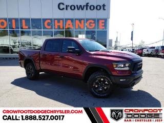 <b>Night Edition, Trailer Hitch!</b><br> <br> <br> <br>  Make light work of tough jobs in this 2023 Ram 1500, with exceptional towing, torque and payload capability. <br> <br>The Ram 1500s unmatched luxury transcends traditional pickups without compromising its capability. Loaded with best-in-class features, its easy to see why the Ram 1500 is so popular. With the most towing and hauling capability in a Ram 1500, as well as improved efficiency and exceptional capability, this truck has the grit to take on any task.<br> <br> This red pearl Crew Cab 4X4 pickup   has an automatic transmission and is powered by a  395HP 5.7L 8 Cylinder Engine.<br> <br> Our 1500s trim level is Rebel. Bold and unapologetic, this Ram 1500 Rebel features beefy off-road suspension including Bilstein dampers, skid plates for underbody protection, gloss black wheels, front fog lamps, power-folding exterior mirrors with courtesy lamps, and black fender flares, with front bumper tow hooks. The standard features continue, with power-adjustable heated front seats with lumbar support, dual-zone climate control, power-adjustable pedals, deluxe sound insulation, and a leather-wrapped steering wheel. Connectivity is handled by an upgraded 8.4-inch display powered by Uconnect 5 with inbuilt navigation, mobile internet hotspot access, Apple CarPlay, Android Auto and SiriusXM streaming radio. Additional features include a power rear window with defrosting, class II towing equipment including a hitch, wiring harness and trailer sway control, heavy-duty suspension, cargo box lighting, and a locking tailgate. This vehicle has been upgraded with the following features: Night Edition, Trailer Hitch. <br><br> <br>To apply right now for financing use this link : <a href=https://www.crowfootdodgechrysler.com/tools/autoverify/finance.htm target=_blank>https://www.crowfootdodgechrysler.com/tools/autoverify/finance.htm</a><br><br> <br/> Total  cash rebate of $7821 is reflected in the price. Credit includes up to 10% MSRP. <br> Buy this vehicle now for the lowest bi-weekly payment of <b>$418.50</b> with $0 down for 96 months @ 5.49% APR O.A.C. ( Plus GST  documentation fee    / Total Obligation of $87047  ).  Incentives expire 2024-02-29.  See dealer for details. <br> <br>We pride ourselves in consistently exceeding our customers expectations. Please dont hesitate to give us a call.<br> Come by and check out our fleet of 80+ used cars and trucks and 180+ new cars and trucks for sale in Calgary.  o~o