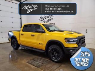 <b>Off-Road Suspension,  SiriusXM,  Apple CarPlay,  Android Auto,  Navigation!</b><br> <br> <br> <br>  Make light work of tough jobs in this 2023 Ram 1500, with exceptional towing, torque and payload capability. <br> <br>The Ram 1500s unmatched luxury transcends traditional pickups without compromising its capability. Loaded with best-in-class features, its easy to see why the Ram 1500 is so popular. With the most towing and hauling capability in a Ram 1500, as well as improved efficiency and exceptional capability, this truck has the grit to take on any task.<br> <br> This yellow Crew Cab 4X4 pickup   has a 8 speed automatic transmission and is powered by a  395HP 5.7L 8 Cylinder Engine.<br> <br> Our 1500s trim level is Rebel. Bold and unapologetic, this Ram 1500 Rebel features beefy off-road suspension including Bilstein dampers, skid plates for underbody protection, gloss black wheels, front fog lamps, power-folding exterior mirrors with courtesy lamps, and black fender flares, with front bumper tow hooks. The standard features continue, with power-adjustable heated front seats with lumbar support, dual-zone climate control, power-adjustable pedals, deluxe sound insulation, and a leather-wrapped steering wheel. Connectivity is handled by an upgraded 8.4-inch display powered by Uconnect 5 with inbuilt navigation, mobile internet hotspot access, Apple CarPlay, Android Auto and SiriusXM streaming radio. Additional features include a power rear window with defrosting, class II towing equipment including a hitch, wiring harness and trailer sway control, heavy-duty suspension, cargo box lighting, and a locking tailgate. This vehicle has been upgraded with the following features: Off-road Suspension,  Siriusxm,  Apple Carplay,  Android Auto,  Navigation,  Heated Seats,  4g Wi-fi. <br><br> View the original window sticker for this vehicle with this url <b><a href=http://www.chrysler.com/hostd/windowsticker/getWindowStickerPdf.do?vin=1C6SRFLT8PN650934 target=_blank>http://www.chrysler.com/hostd/windowsticker/getWindowStickerPdf.do?vin=1C6SRFLT8PN650934</a></b>.<br> <br>To apply right now for financing use this link : <a href=https://www.indianheadchrysler.com/finance/ target=_blank>https://www.indianheadchrysler.com/finance/</a><br><br> <br/> Weve discounted this vehicle $12445. See dealer for details. <br> <br>At Indian Head Chrysler Dodge Jeep Ram Ltd., we treat our customers like family. That is why we have some of the highest reviews in Saskatchewan for a car dealership!  Every used vehicle we sell comes with a limited lifetime warranty on covered components, as long as you keep up to date on all of your recommended maintenance. We even offer exclusive financing rates right at our dealership so you dont have to deal with the banks.
You can find us at 501 Johnston Ave in Indian Head, Saskatchewan-- visible from the TransCanada Highway and only 35 minutes east of Regina. Distance doesnt have to be an issue, ask us about our delivery options!

Call: 306.695.2254<br> Come by and check out our fleet of 40+ used cars and trucks and 80+ new cars and trucks for sale in Indian Head.  o~o