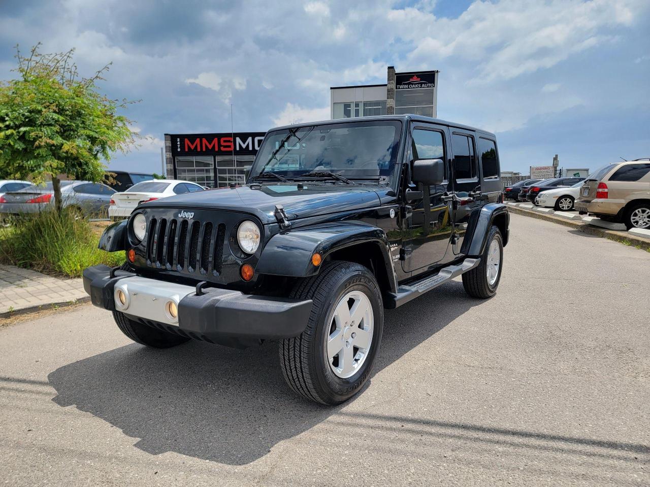 2012 Jeep Wrangler 4WD 4dr Sahara - Photo #1