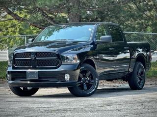 **PLEASE NOTE** AN ADDITIONAL CHARGE OF $998 WILL BE APPLIED FOR DEALER-INSTALLED RUNNING BOARDS  Our 2023 RAM 1500 Classic Express Crew Cab 4X4 is a terrific tool for taking care of business in Diamond Black Crystal Pearl! Powered by a 5.7 Litre HEMI V8 serving up 395hp connected to an 8 Speed Automatic transmission thats eager for action. Heavy-duty shocks are also along for the ride, and this Four Wheel Drive truck sees approximately 11.2L/100km on the highway. Strong and stylish, our 1500 Classic stands out from the crowd with a mighty grille, quad halogen headlamps, fog lamps, heated power mirrors, 17-inch alloy wheels, and handy step pads on the rear bumper.  Youre well prepared for work and more in our bold Express cabin. It keeps you feeling fresh behind the wheel with supportive seats, air conditioning, power accessories, cruise control, a 3.5-inch driver display, and Uconnect technology to handle your infotainment needs. The highlights include a 5-inch touchscreen, Bluetooth, voice recognition, and six-speaker audio. Confidence comes standard with this impressive interior!  RAM regards safety as a top priority, providing features like a backup camera, side-impact door beams, traction/stability control, tire-pressure monitoring, ABS, advanced airbags, and more. Buy our 1500 Classic Express today, and youll be on the path to better trucking tomorrow! Save this Page and Call for Availability. We Know You Will Enjoy Your Test Drive Towards Ownership!