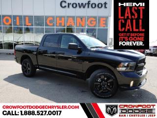 <b>Sunroof, Remote Engine Start, Tech Package, Premium Audio, Trailer Hitch!</b><br> <br> <br> <br>  Get the job done right with this rugged Ram 1500 Classic pickup. <br> <br>The reasons why this Ram 1500 Classic stands above its well-respected competition are evident: uncompromising capability, proven commitment to safety and security, and state-of-the-art technology. From its muscular exterior to the well-trimmed interior, this 2023 Ram 1500 Classic is more than just a workhorse. Get the job done in comfort and style while getting a great value with this amazing full-size truck. <br> <br> This diamond black crystal pearlcoat Crew Cab 4X4 pickup   has an automatic transmission and is powered by a  395HP 5.7L 8 Cylinder Engine.<br> <br> Our 1500 Classics trim level is SLT. This Ram 1500 SLT steps things up with upgraded aluminum wheels, proximity keyless entry, USB connectivity and exterior chrome styling, along with a great selection of standard features such as class II towing equipment including a hitch, wiring harness and trailer sway control, heavy-duty suspension, cargo box lighting, and a locking tailgate. Additional features include heated and power adjustable side mirrors, UCconnect 3, cruise control, air conditioning, vinyl floor lining, and a rearview camera. This vehicle has been upgraded with the following features: Sunroof, Remote Engine Start, Tech Package, Premium Audio, Trailer Hitch. <br><br> <br>To apply right now for financing use this link : <a href=https://www.crowfootdodgechrysler.com/tools/autoverify/finance.htm target=_blank>https://www.crowfootdodgechrysler.com/tools/autoverify/finance.htm</a><br><br> <br/> Total  cash rebate of $14566 is reflected in the price. Credit includes up to 20% MSRP. <br> Buy this vehicle now for the lowest bi-weekly payment of <b>$359.44</b> with $0 down for 96 months @ 6.49% APR O.A.C. ( Plus GST  documentation fee    / Total Obligation of $74763  ).  Incentives expire 2024-02-29.  See dealer for details. <br> <br>We pride ourselves in consistently exceeding our customers expectations. Please dont hesitate to give us a call.<br> Come by and check out our fleet of 80+ used cars and trucks and 180+ new cars and trucks for sale in Calgary.  o~o