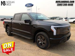 <b>Leather Seats,  Cooled Seats,  Heated Seats!</b><br> <br> <br> <br>Check out our great inventory of new vehicles at Novlan Brothers!<br> <br>  Built to get the job done right, this impressive F-150 Lightning is more than a concept, it is execution on a game changing scale. <br> <br>With an advanced all-electric powertrain, this F-150 Lightning continues the Ford Motors Legacy by producing a futuristic truck thats designed for the masses. More than just a concept, this F-150 Lightning proves that electric vehicles are more than just a gimmick, thanks to it impressive capability and massive network of electric charging station found throughout North America.<br> <br> This agate black Crew Cab 4X4 pickup   has a single speed transmission and is powered by a  DUAL EMOTOR - EXTENDED RANGE BATTERY engine.<br> <br> Our F-150 Lightnings trim level is Lariat High Package. This F-150 Lightning with the Lariat High Package comes with an extra luxurious leather interior that features a massive sunroof, Fords SYNC 4A, complete with a larger 15 inch touchscreen, built-in navigation, wireless Apple CarPlay, Android Auto, and a premium Bang and Olufsen audio system. It also comes with heated and cooled front seats, a heated steering wheel, power adjustable pedals, heated second row seats, extended battery range, Ford Co-Pilot360 Active 2.0, and a super useful interior work surface. Additional features include a power locking tailgate, a large front trunk for extra storage, pro trailer backup assist, blind spot detection, lane keep assist, automatic emergency braking with pedestrian detection, accident evasion assist, and a 360 degree camera to help keep you safely on the road and so much more! This vehicle has been upgraded with the following features: Leather Seats,  Cooled Seats,  Heated Seats. <br><br> View the original window sticker for this vehicle with this url <b><a href=http://www.windowsticker.forddirect.com/windowsticker.pdf?vin=1FTVW1EVXPWG08887 target=_blank>http://www.windowsticker.forddirect.com/windowsticker.pdf?vin=1FTVW1EVXPWG08887</a></b>.<br> <br>To apply right now for financing use this link : <a href=http://novlanbros.com/credit/ target=_blank>http://novlanbros.com/credit/</a><br><br> <br/> Weve discounted this vehicle $3500. Total  cash rebate of $14000 is reflected in the price. Credit includes $14,000 Non-Stackable Cash Purchase Assistance. Credit is available in lieu of subvented financing rates.  Incentives expire 2024-05-08.  See dealer for details. <br> <br><br> Come by and check out our fleet of 30+ used cars and trucks and 40+ new cars and trucks for sale in Paradise Hill.  o~o