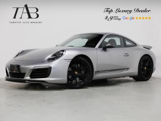 This Powerful 2018 Porsche 911 Carrera T is a local Ontario vehicle. It offers a unique and exhilarating driving experience with its focused design, powerful performance, and driver-oriented features, it appeals to enthusiasts seeking a more purist and engaging sports car.

Key Features Includes :

- Navigation
- Bluetooth
- Backup Camera
- BOSE Surround Sound System
- Sirius XM Radio
- Heated Steering Wheel
- Bucket Seats with 911 Stitch
- Carbon Fiber Interior
- Spoiler
- Porsche Dynamic Light System
- Cruise control
- Sports exhaust system
- 20" Alloy Wheels

NOW OFFERING 3 MONTH DEFERRED FINANCING PAYMENTS ON APPROVED CREDIT. 

Looking for a top-rated pre-owned luxury car dealership in the GTA? Look no further than Toronto Auto Brokers (TAB)! Were proud to have won multiple awards, including the 2023 GTA Top Choice Luxury Pre Owned Dealership Award, 2023 CarGurus Top Rated Dealer, 2023 CBRB Dealer Award, the 2023 Three Best Rated Dealer Award, and many more!

With 30 years of experience serving the Greater Toronto Area, TAB is a respected and trusted name in the pre-owned luxury car industry. Our 30,000 sq.Ft indoor showroom is home to a wide range of luxury vehicles from top brands like BMW, Mercedes-Benz, Audi, Porsche, Land Rover, Jaguar, Aston Martin, Bentley, Maserati, and more. And we dont just serve the GTA, were proud to offer our services to all cities in Canada, including Vancouver, Montreal, Calgary, Edmonton, Winnipeg, Saskatchewan, Halifax, and more.

At TAB, were committed to providing a no-pressure environment and honest work ethics. As a family-owned and operated business, we treat every customer like family and ensure that every interaction is a positive one. Come experience the TAB Lifestyle at its truest form, luxury car buying has never been more enjoyable and exciting!

We offer a variety of services to make your purchase experience as easy and stress-free as possible. From competitive and simple financing and leasing options to extended warranties, aftermarket services, and full history reports on every vehicle, we have everything you need to make an informed decision. We welcome every trade, even if youre just looking to sell your car without buying, and when it comes to financing or leasing, we offer same day approvals, with access to over 50 lenders, including all of the banks in Canada. Feel free to check out your own Equifax credit score without affecting your credit score, simply click on the Equifax tab above and see if you qualify.

So if youre looking for a luxury pre-owned car dealership in Toronto, look no further than TAB! We proudly serve the GTA, including Toronto, Etobicoke, Woodbridge, North York, York Region, Vaughan, Thornhill, Richmond Hill, Mississauga, Scarborough, Markham, Oshawa, Peteborough, Hamilton, Newmarket, Orangeville, Aurora, Brantford, Barrie, Kitchener, Niagara Falls, Oakville, Cambridge, Kitchener, Waterloo, Guelph, London, Windsor, Orillia, Pickering, Ajax, Whitby, Durham, Cobourg, Belleville, Kingston, Ottawa, Montreal, Vancouver, Winnipeg, Calgary, Edmonton, Regina, Halifax, and more.

Call us today or visit our website to learn more about our inventory and services. And remember, all prices exclude applicable taxes and licensing, and vehicles can be certified at an additional cost of $699.