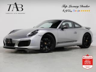 This Powerful 2018 Porsche 911 Carrera T is a local Ontario vehicle. It offers a unique and exhilarating driving experience with its focused design, powerful performance, and driver-oriented features, it appeals to enthusiasts seeking a more purist and engaging sports car.

Key Features Includes :

- Navigation
- Bluetooth
- Backup Camera
- BOSE Surround Sound System
- Sirius XM Radio
- Heated Steering Wheel
- Bucket Seats with 911 Stitch
- Carbon Fiber Interior
- Spoiler
- Porsche Dynamic Light System
- Cruise control
- Sports exhaust system
- 20" Alloy Wheels

NOW OFFERING 3 MONTH DEFERRED FINANCING PAYMENTS ON APPROVED CREDIT. 

Looking for a top-rated pre-owned luxury car dealership in the GTA? Look no further than Toronto Auto Brokers (TAB)! Were proud to have won multiple awards, including the 2023 GTA Top Choice Luxury Pre Owned Dealership Award, 2023 CarGurus Top Rated Dealer, 2023 CBRB Dealer Award, the 2023 Three Best Rated Dealer Award, and many more!

With 30 years of experience serving the Greater Toronto Area, TAB is a respected and trusted name in the pre-owned luxury car industry. Our 30,000 sq.Ft indoor showroom is home to a wide range of luxury vehicles from top brands like BMW, Mercedes-Benz, Audi, Porsche, Land Rover, Jaguar, Aston Martin, Bentley, Maserati, and more. And we dont just serve the GTA, were proud to offer our services to all cities in Canada, including Vancouver, Montreal, Calgary, Edmonton, Winnipeg, Saskatchewan, Halifax, and more.

At TAB, were committed to providing a no-pressure environment and honest work ethics. As a family-owned and operated business, we treat every customer like family and ensure that every interaction is a positive one. Come experience the TAB Lifestyle at its truest form, luxury car buying has never been more enjoyable and exciting!

We offer a variety of services to make your purchase experience as easy and stress-free as possible. From competitive and simple financing and leasing options to extended warranties, aftermarket services, and full history reports on every vehicle, we have everything you need to make an informed decision. We welcome every trade, even if youre just looking to sell your car without buying, and when it comes to financing or leasing, we offer same day approvals, with access to over 50 lenders, including all of the banks in Canada. Feel free to check out your own Equifax credit score without affecting your credit score, simply click on the Equifax tab above and see if you qualify.

So if youre looking for a luxury pre-owned car dealership in Toronto, look no further than TAB! We proudly serve the GTA, including Toronto, Etobicoke, Woodbridge, North York, York Region, Vaughan, Thornhill, Richmond Hill, Mississauga, Scarborough, Markham, Oshawa, Peteborough, Hamilton, Newmarket, Orangeville, Aurora, Brantford, Barrie, Kitchener, Niagara Falls, Oakville, Cambridge, Kitchener, Waterloo, Guelph, London, Windsor, Orillia, Pickering, Ajax, Whitby, Durham, Cobourg, Belleville, Kingston, Ottawa, Montreal, Vancouver, Winnipeg, Calgary, Edmonton, Regina, Halifax, and more.

Call us today or visit our website to learn more about our inventory and services. And remember, all prices exclude applicable taxes and licensing, and vehicles can be certified at an additional cost of $699.