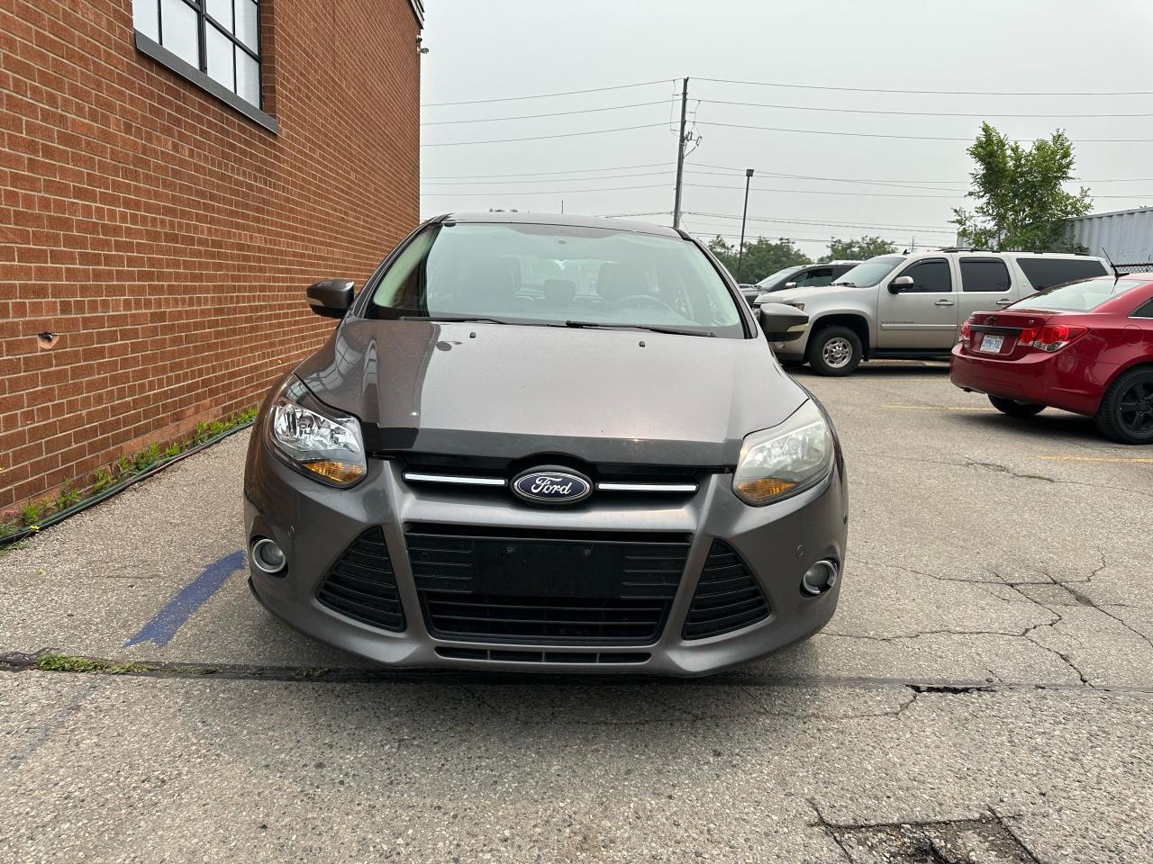 2013 Ford Focus Titanium Navigation Leather Photo