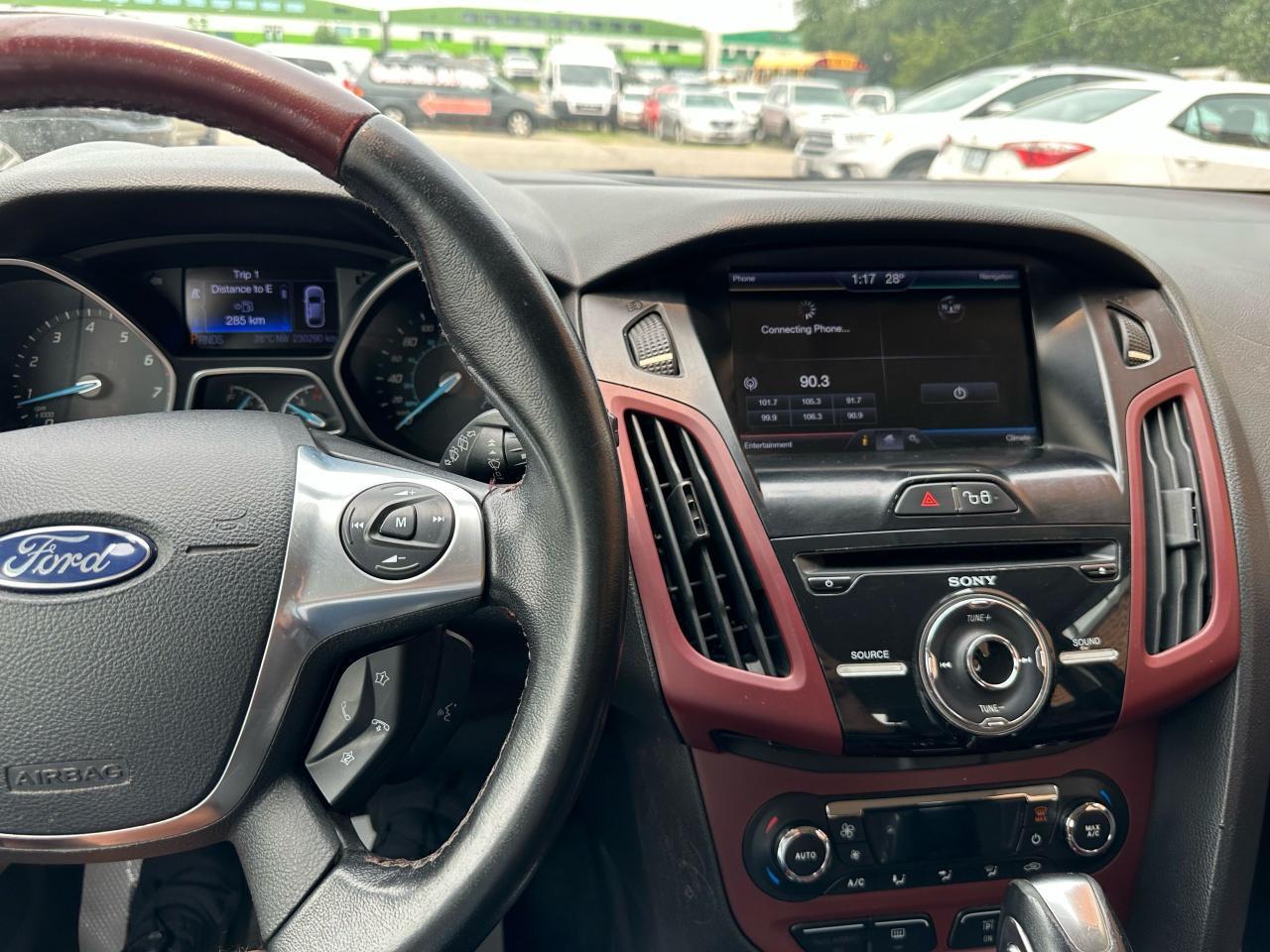 2013 Ford Focus Titanium Navigation Leather Photo