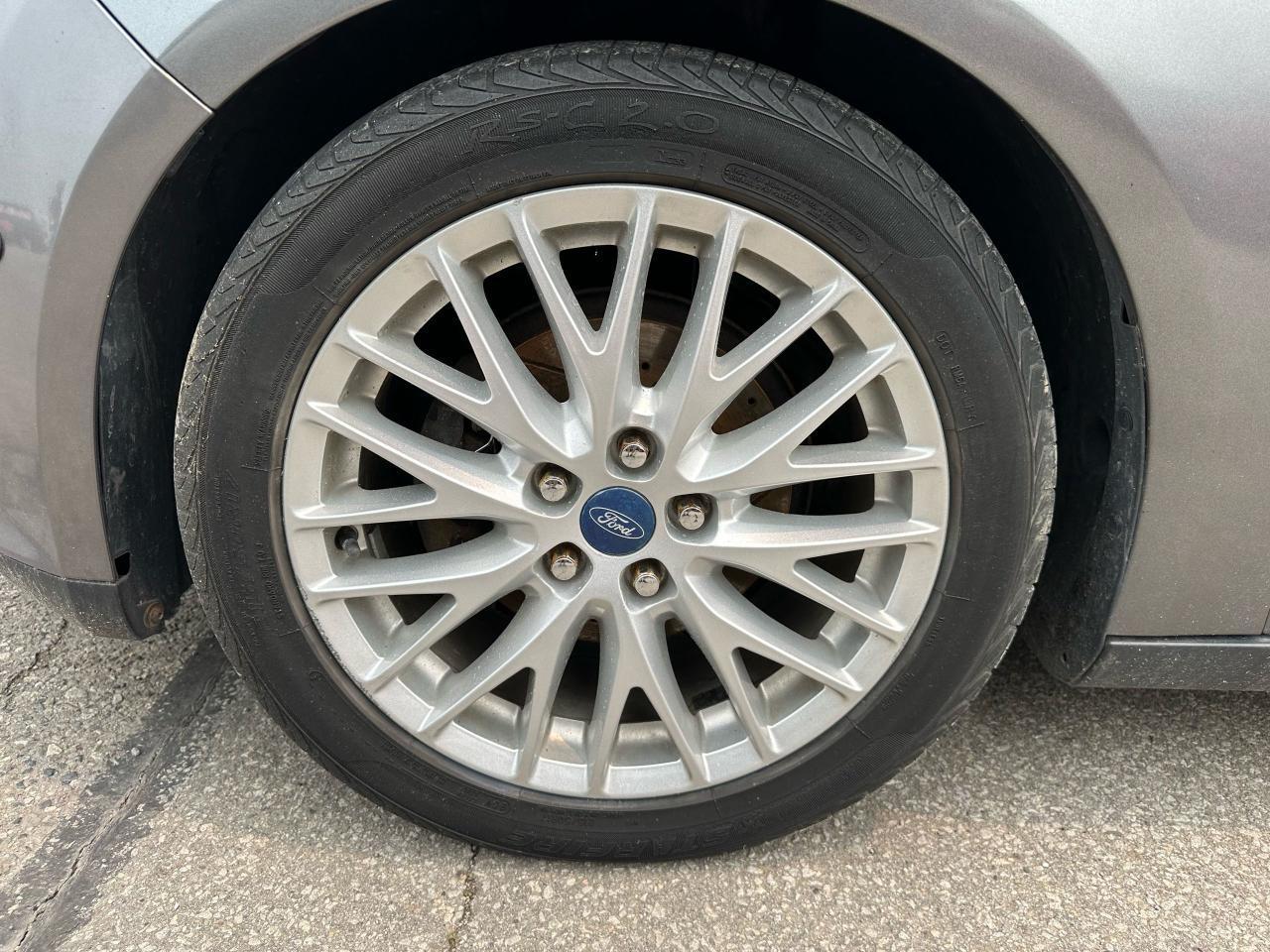 2013 Ford Focus Titanium Navigation Leather Photo