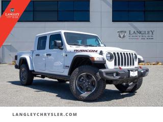 <p><strong><span style=font-family:Arial; font-size:16px;>Experience the thrill of commanding the road with the 2023 Jeep Gladiator Rubicon, now available at Langley Chrysler..</span></strong></p> <p><strong><span style=font-family:Arial; font-size:16px;>This awe-inspiring creation is more than a pickup; its an embodiment of strength, versatility, and luxury, ready to conquer any terrain..</span></strong> <br> Nestled under the hood of this beast is a potent 3.6L 6-cylinder engine paired with an 8-speed automatic transmission.. This dynamic duo assures an exhilarating performance, whether youre cruising the city streets or venturing off the beaten path.</p> <p><strong><span style=font-family:Arial; font-size:16px;>Stepping inside the Gladiator Rubicon, youll be greeted by an exquisite black interior, designed to blend comfort with functionality..</span></strong> <br> A plethora of features stand ready to enhance your driving experience, including a state-of-the-art navigation system, tachometer, compass, and an automatic temperature control system.. The sleek design of the cockpit ensures every control is within your reach, while the auto-dimming rearview mirror, and fully automatic headlights allow for a stress-free drive.</p> <p><strong><span style=font-family:Arial; font-size:16px;>Safety hasnt been compromised either..</span></strong> <br> With features like ABS brakes, traction control, and electronic stability, you can enjoy peace of mind knowing youre well protected.. And lets not forget about the Gladiators integrated roll-over protection, occupant sensing airbag, and ignition disable feature, underscoring Jeeps commitment to your safety.</p> <p><strong><span style=font-family:Arial; font-size:16px;>Not only are you going to love this brand new Jeep Gladiator Rubicon, but you will also love buying it..</span></strong> <br> We dont just sell vehicles; we create long-lasting relationships with our clients.. Fun fact? The Gladiator is the only pickup in the market that offers a convertible option a testament to Jeeps ingenuity.</p> <p><strong><span style=font-family:Arial; font-size:16px;>Imagine cruising under the open sky during summer or gazing at the stars during a wilderness adventure! So why wait? Come down to Langley Chrysler and experience the unrivaled elegance and performance of the brand new 2023 Jeep Gladiator Rubicon..</span></strong> <br> With its unmatched capability and luxurious comfort, this vehicle truly stands above the rest.. Remember, dont just love your car, love buying it! Your brand new adventure awaits</p>.Documentation Fee $968, Finance Placement $628, Safety & Convenience Warranty $699

<p>*All prices are net of all manufacturer incentives and/or rebates and are subject to change by the manufacturer without notice. All prices plus applicable taxes, applicable environmental recovery charges, documentation of $599 and full tank of fuel surcharge of $76 if a full tank is chosen.<br />Other items available that are not included in the above price:<br />Tire & Rim Protection and Key fob insurance starting from $599<br />Service contracts (extended warranties) for up to 7 years and 200,000 kms starting from $599<br />Custom vehicle accessory packages, mudflaps and deflectors, tire and rim packages, lift kits, exhaust kits and tonneau covers, canopies and much more that can be added to your payment at time of purchase<br />Undercoating, rust modules, and full protection packages starting from $199<br />Flexible life, disability and critical illness insurances to protect portions of or the entire length of vehicle loan?im?im<br />Financing Fee of $500 when applicable<br />Prices shown are determined using the largest available rebates and incentives and may not qualify for special APR finance offers. See dealer for details. This is a limited time offer.</p>