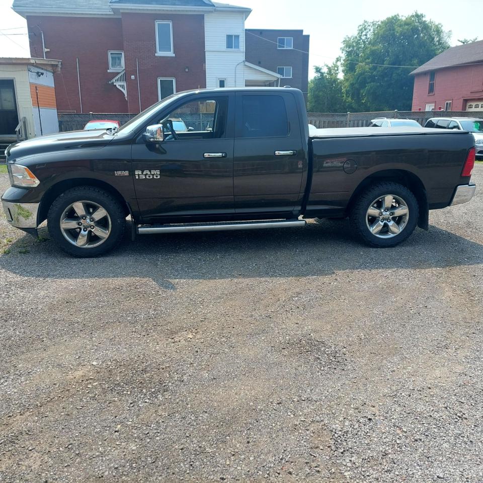 2013 RAM 1500 4WD QUAD CAB 140.5" BIG HORN - Photo #1