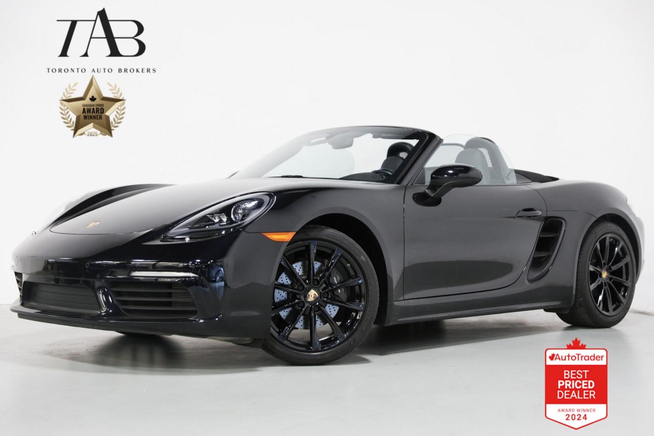 This Beautiful 2019 Porsche 718 Boxster has a clean Carfax Canada Report.
Its sleek exterior design, comfortable interior, advanced technology features, and impressive performance make it an ideal choice for enthusiasts seeking a convertible sports car that delivers both thrills and refinement.

Key Features Includes:

- Navigation
- Bluetooth
- Backup Camera
- BOSE® Surround Sound-System
- Apple® CarPlay
- Sirius XM Radio
- Power convertible roof
- Heated Multifunction Steering Wheel
- Luggage net in passenger footwell
- Porsche Dynamic Light System (PDLS)
- Cruise Control
- Spoiler
- Porsche Entry & Drive
- Light Design Package
- GT Sport Steering Wheel
- Automatically dimming mirrors with integrated rain sensor
- 19" Alloy Wheels

WE OFFER THE BEST FINANCE RATES, AND DONT CHARGE ANY FINANCING FEE

Looking for a top-rated pre-owned luxury car dealership in the GTA? Look no further than Toronto Auto Brokers (TAB)! Were proud to have won multiple awards, including the 2023 GTA Top Choice Luxury Pre Owned Dealership Award, 2023 CarGurus Top Rated Dealer, 2023 CBRB Dealer Award, the 2023 Three Best Rated Dealer Award, and many more!

With 30 years of experience serving the Greater Toronto Area, TAB is a respected and trusted name in the pre-owned luxury car industry. Our 30,000 sq.Ft indoor showroom is home to a wide range of luxury vehicles from top brands like BMW, Mercedes-Benz, Audi, Porsche, Land Rover, Jaguar, Aston Martin, Bentley, Maserati, and more. And we dont just serve the GTA, were proud to offer our services to all cities in Canada, including Vancouver, Montreal, Calgary, Edmonton, Winnipeg, Saskatchewan, Halifax, and more.

At TAB, were committed to providing a no-pressure environment and honest work ethics. As a family-owned and operated business, we treat every customer like family and ensure that every interaction is a positive one. Come experience the TAB Lifestyle at its truest form, luxury car buying has never been more enjoyable and exciting!

We offer a variety of services to make your purchase experience as easy and stress-free as possible. From competitive and simple financing and leasing options to extended warranties, aftermarket services, and full history reports on every vehicle, we have everything you need to make an informed decision. We welcome every trade, even if youre just looking to sell your car without buying, and when it comes to financing or leasing, we offer same day approvals, with access to over 50 lenders, including all of the banks in Canada. Feel free to check out your own Equifax credit score without affecting your credit score, simply click on the Equifax tab above and see if you qualify.

So if youre looking for a luxury pre-owned car dealership in Toronto, look no further than TAB! We proudly serve the GTA, including Toronto, Etobicoke, Woodbridge, North York, York Region, Vaughan, Thornhill, Richmond Hill, Mississauga, Scarborough, Markham, Oshawa, Peteborough, Hamilton, Newmarket, Orangeville, Aurora, Brantford, Barrie, Kitchener, Niagara Falls, Oakville, Cambridge, Kitchener, Waterloo, Guelph, London, Windsor, Orillia, Pickering, Ajax, Whitby, Durham, Cobourg, Belleville, Kingston, Ottawa, Montreal, Vancouver, Winnipeg, Calgary, Edmonton, Regina, Halifax, and more.

Call us today or visit our website to learn more about our inventory and services. And remember, all prices exclude applicable taxes and licensing, and vehicles can be certified at an additional cost of $799.