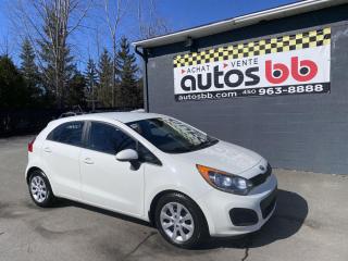 Used 2015 Kia Rio Hatchback ( AUTOMATIQUE - 164 000 KM ) for sale in Laval, QC