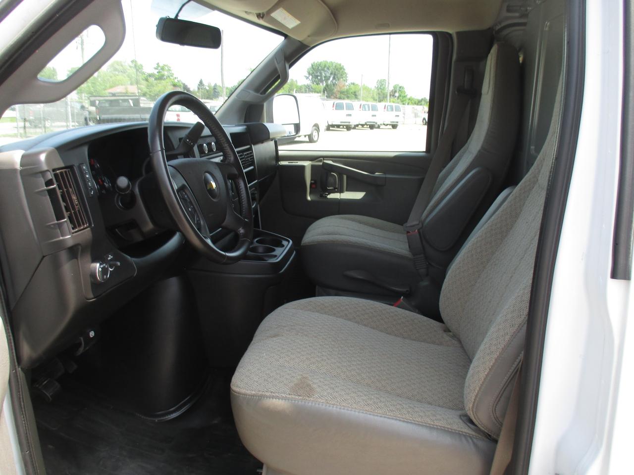2022 Chevrolet Express 2500 RWD 2500 135" with roof racks and cargo shelves. - Photo #10