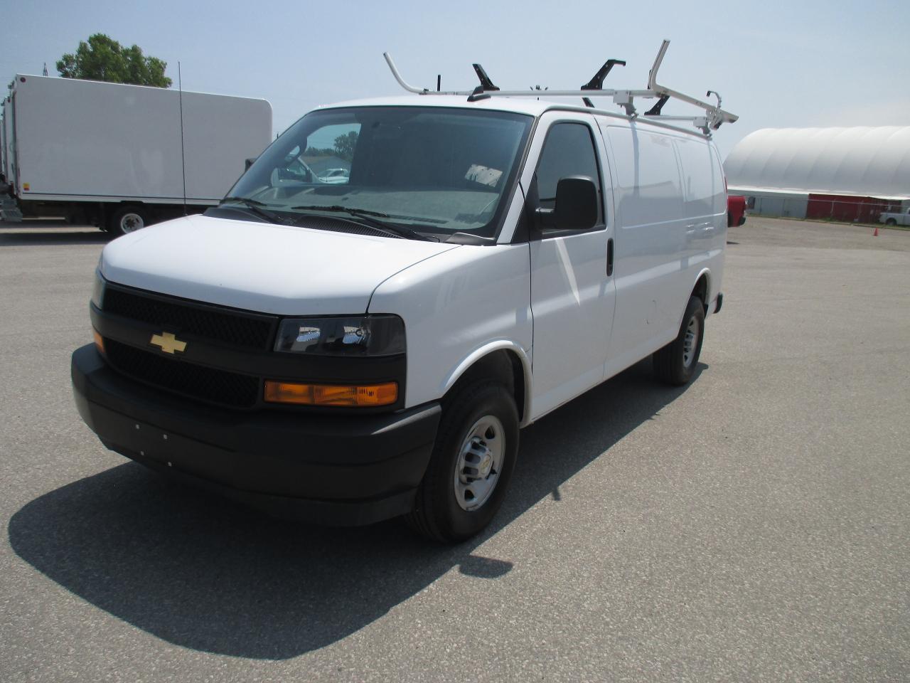 2022 Chevrolet Express 2500 RWD 2500 135" with roof racks and cargo shelves. - Photo #2