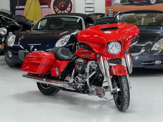 <p>Now with 7.99 % bank financing, oac. Spectacular Street Glide in iconic Laguna Orange Metallic with Factory Graphics. Original, Unmodified and Undamaged. Certified, Road tested and detailed. 100% satisfaction guaranteed!<br /><br />2017 was a major upgrade year for the HD Touring bikes. The 2017 Harley-Davidson Street Glide Special gets a few important features that make it Special. Linked braking with ABS, a high-end infotainment system, a security system, and upgraded paint are the primary differentiators from the standard Street Glide. The big story for the 2017 Harley-Davidson Street Glide Special is the new Milwaukee-Eight 107ci engine. Featuring 111 ft/lbs of torque at 3250 rpm, the air-cooled 107ci powerplant (with oil-cooled heads) has flawless power delivery everywhere in the power band. Unlike the Twin Cam it replaces, which most certainly tapered off towards the upper regions of the rev-range, the Milwaukee-Eight shows no signs of doing so. The M-E spools up with much more urgency than its predecessor, especially in the further regions of rpm. Another point of praise is the Street Glide Special’s 2-1-2 exhaust. While it doesn’t have the boom of an aftermarket system, I certainly grinned when I’d open the Street Glide Special up. In short, it sounds superb. <br /><br /></p>