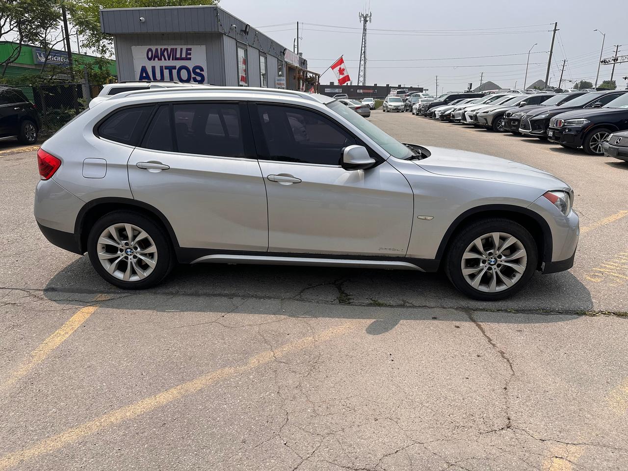 2012 BMW X1 28i AWD, Certified with Warranty, Leather, Roof Photo