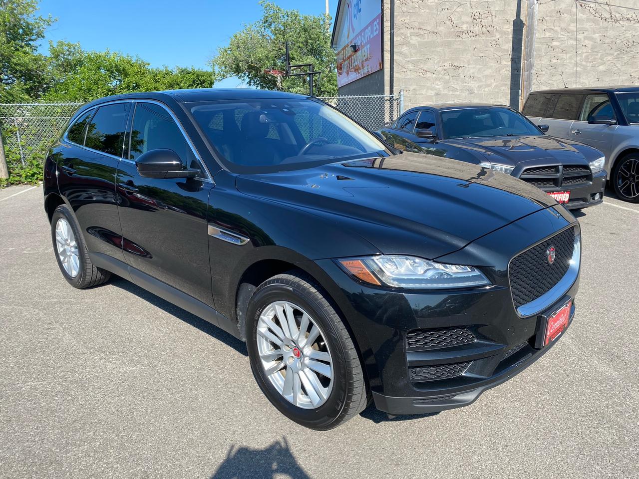 <p>NEW TIMING CHAINS * LANE DEPARTURE WARNING * FORWARD COLLISION AUTO BRAKES * APPLE CARPLAY * DUAL AUTO CLIMATE CONTROL * 3 POSITION MEMORY DRIVER SEAT * BLINDSPOT MONITOR * REAR CROSS TRAFFIC ALERT * 2.0L 4 CYL., AUTO, AWD, PRESTIGE * POWER LOCKS, WINDOWS, MIRRORS, SEAT, LIFT GATE, SUNROOF & KEYLESS ENTRY * PROXIMITY KEY w/ PUSH BUTTON START * ABS & TRACTION CONTROL * STEERING WHEEL MOUNTED CRUISE & STEREO CONTROLS * NAVIGATION * HEATED LEATHER SEATS * REVERSE CAMERA * 19 ALLOY WHEELS *</p><p>&nbsp;</p><div>INCLUDED IN YOUR PURCHASE IS A SAFETY CERTIFICATION, FRESH OIL CHANGE, AND A 60-DAY LIMITED POWERTRAIN GUARANTEE.</div><div>&nbsp;&nbsp;</div><div>WE ALSO OFFER EXTENDED WARRANTIES FOR ADDED PEACE OF MIND. NO MATTER YOUR CREDIT HISTORY, WE PROVIDE FINANCING OPTIONS FOR ALL CREDIT TYPES. NOT ALL VEHICLES QUALIFY FOR FINANCING.&nbsp; CONTACT DEALER FOR DETAILS.</div><div>VISIT OUR WEBSITE AT WWW.CERTIFIED-CARS.COM TO EXPLORE OUR INVENTORY OF USED CARS, TRUCKS, AND SUVS.&nbsp;</div><div>&nbsp;</div><div>LOCATED IN THE NIAGARA REGION, WE ARE PROUD TO SERVE CUSTOMERS FROM ST. CATHARINES, NIAGARA FALLS, WELLAND, PORT COLBORNE, HAMILTON, AND BEYOND.&nbsp;</div><div>OUR LOT FEATURES A VARIETY OF MAKES AND MODELS INCLUDING CHEVROLET, FORD, GMC, PONTIAC, BUICK, OLDSMOBILE, CADILLAC, DODGE, CHRYSLER, SATURN, MAZDA, TOYOTA, HONDA, BMW, AUDI, MERCEDES BENZ, NISSAN, AND HYUNDAI. WITH AN EXTENSIVE INVENTORY OF UP TO 100 VEHICLES, WE ARE CONFIDENT YOU WILL FIND THE PERFECT VEHICLE FOR YOUR NEEDS.</div><p>Prepare to be captivated by the sleek and powerful 2018 Jaguar F-PACE Prestige, now available at Certified Cars! This stunning Black SUV, with a matching Black interior, is guaranteed to turn heads wherever you go. Featuring a robust 2L I4 Turbo engine paired with an automatic transmission and all-wheel drive, this F-PACE delivers an exhilarating driving experience. With only 146,789km on the odometer, this well-maintained Jaguar is ready to take on your next adventure.</p><p>The F-PACE Prestige is loaded with luxury and convenience features, making every journey a pleasure. Enjoy the comfort of heated leather seats, stay connected with Apple CarPlay and Bluetooth, and navigate with ease using the integrated GPS navigation system. This Jaguar also boasts a comprehensive safety suite that includes blind spot monitoring, rear cross-traffic alert, and a rearview camera, giving you peace of mind on every drive.</p><p>Get ready to experience the ultimate blend of performance, luxury, and safety in the 2018 Jaguar F-PACE Prestige. Visit Certified Cars today and let this exceptional SUV become your next ride.</p><p><strong>Here are 5 of the F-PACE Prestiges most sizzling features:</strong></p><ul><li><strong>Sleek Black Exterior and Luxurious Black Interior:</strong> Turn heads with the timeless elegance of this Jaguar.</li><li><strong>Heated Leather Seats:</strong> Experience ultimate comfort and warmth on every drive.</li><li><strong>Blind Spot Monitoring and Rear Cross-Traffic Alert:</strong> Drive with confidence and peace of mind.</li><li><strong>Apple CarPlay and Bluetooth:</strong> Stay connected and entertained on the go.</li><li><strong>GPS Navigation System:</strong> Navigate your world with ease and precision.</li></ul><p><em>Powered by AutoIntelligence&trade; AI</em></p>