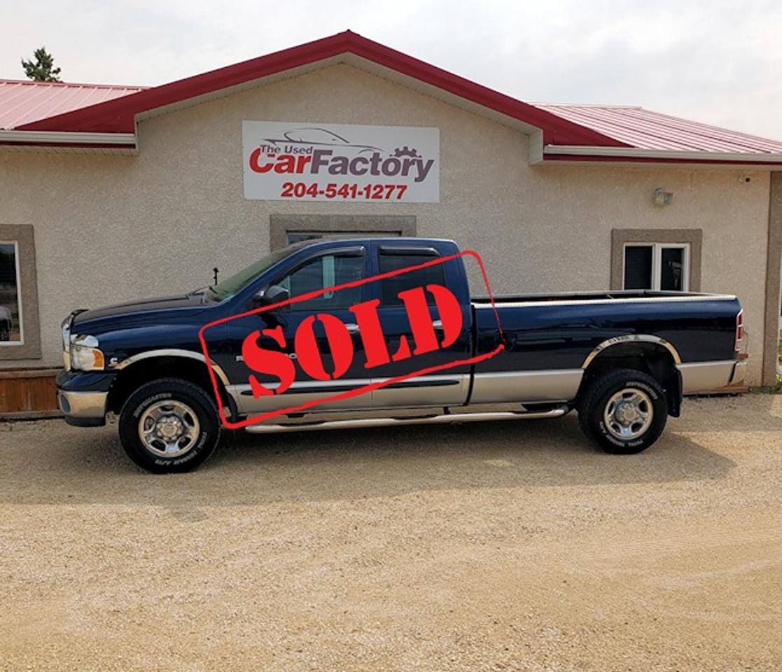 <p>****SOLD****</p><p>New Safety, Accident Free, one owner (bought as a demo in 2003) only 276,679 km on this long box 5.9L Cummings Turbo Diesel Ram 2500 Quad Cab.&nbsp;&nbsp;</p><p>Air, Tilt, Cruise, Power Windows, Lock, and Mirrors, Power Drivers Seat, Steering Wheel Controls, 5th wheel hitch included, Plus so much more</p><p>&nbsp;</p><p>Proud members of The Manitoba Used Car Dealer Association as well as the Manitoba Chamber of Commerce.</p><p>All payments, and prices, are plus applicable taxes. Dealers permit #4821</p>