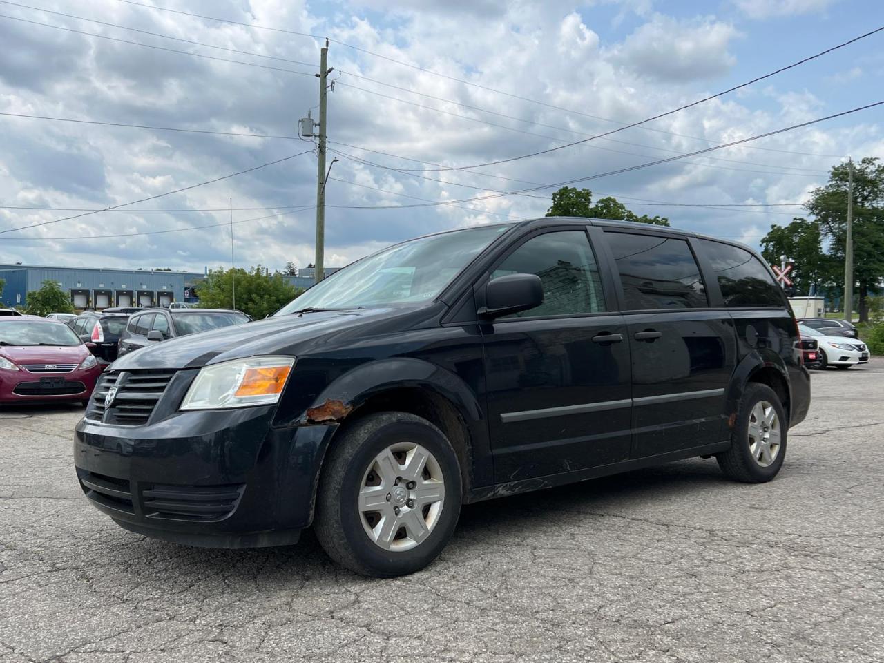 Used 2010 Dodge Grand Caravan **** AS IS SALE ***7 Passenger * Cruise Control * Folding Back Seats * Removable Rear Seats * Automatic/Manual Mode * Cloth Seats * Traction Control * for sale in Cambridge, ON