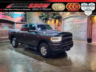 <strong>*** BARELY BROKEN IN!! SUPER LOW KILOMETERS  and  BIG OPTION LIST!!  LEVEL 2 RAM 2500 CREW CAB *** 8.4 INCH TOUCHSCREEN, APPLE CARPLAY / ANDROID AUTO, SPORT CONSOLE *** HEATED SEATS, HEATED STEERING WHEEL, FACTORY REMOTE START *** </strong>Get out and enjoy your summer with this Ram 2500! Decked out and ready to tow, enjoy your ride to work or the lake with features like the <strong>8.4 INCH TOUCHSCREEN</strong>......Apple CarPlay / Android Auto......<strong>REARVIEW BACKUP CAMERA</strong>......Heated Seats......<strong>HEATED STEERING WHEEL</strong>......Premium Cloth Buckets Seats w/ Sport Console......<strong>OFF ROAD PACKAGE</strong>......Hill Descent Control......Off-Road Decal......<strong>SPORT APPEARANCE PACKAGE</strong>......Colour Matched Front & Rear Bumpers & Handles......Matte Black Running Boards......Black Interior Accents......7 Inch Customizable In Dash Display......Automatic Dual Zone Climate Control......8 Way Power Adjustable Drivers Seat w/ 2 Way Adjustable Lumbar Support......Premium Lighting Package w/ LED Fog Lights, Head Lights &  Tail Lights......<strong>4G LTE</strong> Wifi Hotspot......<strong>FACTORY REMOTE START</strong>......Power Sliding Rear Window......Rear Window Defroster......Power Adjustable Pedals......Garage Door Opener......Steering Wheel Media Controls......Keyless Entry......400 Watt Inverter......115 Volt Exterior Power Outlet......<strong>HEAVY DUTY </strong>Front & Rear Shocks......Locking Rear Differential......Dampened Tail Gate......<strong>SPRAY IN BED LINER......Tonneau Cover.</strong>.....Electronic Shift-on-the-fly <strong>4x4 / 4WD </strong>System......<strong>8 SPEED AUTOMATIC TRANSMISSION</strong>......Tow Hooks......Power Folding Tow Mirrors.......<strong>FACTORY TOW PACKAGE</strong> w/ 4-pin & 7-pin Wiring......Factory Integrated Trailer Brake Controller......Transmission TOW / HAUL MODE......Trailer Sway Control......powerful 6.4L V8 Hemi Engine......18 Inch Factory Wheels!!  Only 26,000 kilometers!! <br /><br />This Ram 2500 Comes with all Original Books & Manuals, two Keys & Fobs, balance of factory 100,000 KM RAM WARRANTY, and all season floor mats. Now sale Priced at $64,800 with financing and Extended warranty options available!<br /><br />Will accept trades. Please call (204)560-6287 or View at 3165 McGillivray Blvd. (Conveniently located two minutes West from Costco at corner of Kenaston and McGillivray Blvd.)<br /><br />In addition to this please view our complete inventory of used <a href=\https://www.autoshowwinnipeg.com/used-trucks-winnipeg/\>trucks</a>, used <a href=\https://www.autoshowwinnipeg.com/used-cars-winnipeg/\>SUVs</a>, used <a href=\https://www.autoshowwinnipeg.com/used-cars-winnipeg/\>Vans</a>, used <a href=\https://www.autoshowwinnipeg.com/new-used-rvs-winnipeg/\>RVs</a>, and used <a href=\https://www.autoshowwinnipeg.com/used-cars-winnipeg/\>Cars</a> in Winnipeg on our website: <a href=\https://www.autoshowwinnipeg.com/\>WWW.AUTOSHOWWINNIPEG.COM</a><br /><br />Complete comprehensive warranty is available for this vehicle. Please ask for warranty option details. All advertised prices and payments plus taxes (where applicable).<br /><br />Winnipeg, MB - Manitoba Dealer Permit # 4908