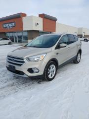 Come Finance this vehicle with us. Apply on our website stonebridgeauto.com<br><div>
2017 Ford Escape SE with 147000km. 1.5L 4 cylinder front wheel drive Clean title and safetied. No major collisions. 

Back up camera 
Heated seats 
Dual climate control 
Auto start stop 
Bluetooth 
Traction control 

We take trades! Vehicle is for sale in Steinbach by STONE BRIDGE AUTO INC. Dealer #5000 we are a small business focused on customer satisfaction. Financing is available if needed. Text or call before coming to view and ask for sales. </div>