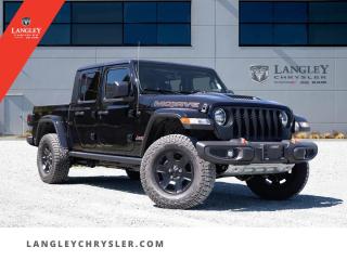 <p><strong><span style=font-family:Arial; font-size:16px;>Encounter an unparalleled fusion of design and performance in the extraordinary 2023 Jeep Gladiator Mojave..</span></strong></p> <p><strong><span style=font-family:Arial; font-size:16px;>This black beauty, brand new and untouched, is waiting to blaze a trail of adventure with you..</span></strong> <br> Brought to you by Langley Chrysler, this Jeep Gladiator Mojave exudes an aura of robust masculinity, complemented with a hint of refined elegance.. Its glossy black exterior, matching black interior, and powerful 3.6L 6cyl engine make it a sight to behold and a force to reckon with.</p> <p><strong><span style=font-family:Arial; font-size:16px;>This is not just a Pickup, its a statement..</span></strong> <br> A statement of strength, a statement of style, and a statement of substance.. Its 8 Speed Automatic transmission guarantees a smooth and controlled ride, while the traction control ensures maximum grip and safety on every terrain.</p> <p><strong><span style=font-family:Arial; font-size:16px;>The Mojave is not just about raw power, its about smart power..</span></strong> <br> With features like an integrated Navigation System, a Tachometer, and a Compass, its designed to keep you on course and in control.. The ABS Brakes, Air Conditioning, Power Windows, and Power Steering add to the convenience, while the Crew Cab offers ample space for your crew and your gear.</p> <p><strong><span style=font-family:Arial; font-size:16px;>The interior is adorned with premium cloth, instilling a sense of luxury and comfort..</span></strong> <br> The auto-dimming rearview mirror, automatic temperature control, and leather steering wheel add a touch of sophistication to your journey.. But the Mojave is not just about the journey, its about the destination too.</p> <p><strong><span style=font-family:Arial; font-size:16px;>And with the manual driver lumbar support and a configurable seating arrangement, every destination feels like a victory..</span></strong> <br> At Langley Chrysler, you wont just love your car, youll love buying it.. We believe in delivering an experience that is as exceptional as the vehicles we sell.</p> <p><strong><span style=font-family:Arial; font-size:16px;>We believe in creating relationships, not transactions..</span></strong> <br> So, come, be a part of the Langley Chrysler family.. In the world full of ordinary, be extraordinary,. In the world full of mundane, be insane,. Choose the 2023 Jeep Gladiator Mojave, Choose Adventure...Documentation Fee $968, Finance Placement $628, Safety & Convenience Warranty $699

<p>*All prices are net of all manufacturer incentives and/or rebates and are subject to change by the manufacturer without notice. All prices plus applicable taxes, applicable environmental recovery charges, documentation of $599 and full tank of fuel surcharge of $76 if a full tank is chosen.<br />Other items available that are not included in the above price:<br />Tire & Rim Protection and Key fob insurance starting from $599<br />Service contracts (extended warranties) for up to 7 years and 200,000 kms starting from $599<br />Custom vehicle accessory packages, mudflaps and deflectors, tire and rim packages, lift kits, exhaust kits and tonneau covers, canopies and much more that can be added to your payment at time of purchase<br />Undercoating, rust modules, and full protection packages starting from $199<br />Flexible life, disability and critical illness insurances to protect portions of or the entire length of vehicle loan?im?im<br />Financing Fee of $500 when applicable<br />Prices shown are determined using the largest available rebates and incentives and may not qualify for special APR finance offers. See dealer for details. This is a limited time offer.</p>