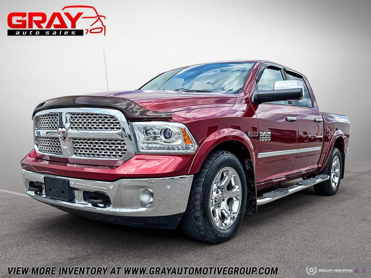 2014 RAM 1500 4WD Crew Cab 140.5" Laramie