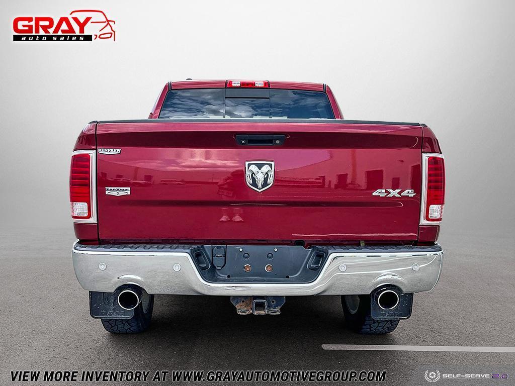 2014 RAM 1500 4WD Crew Cab 140.5" Laramie - Photo #4