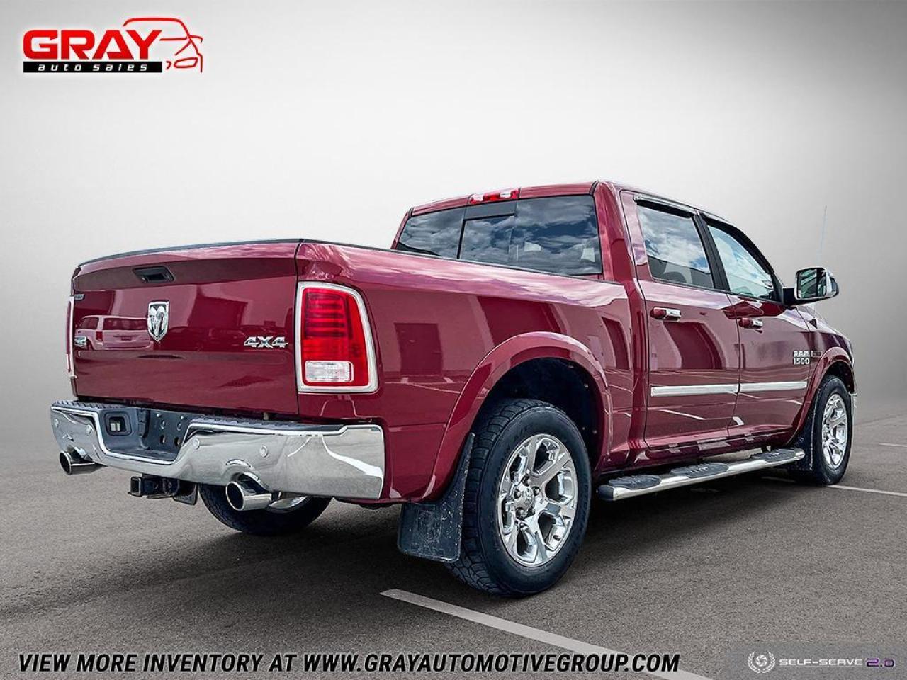 2014 RAM 1500 4WD Crew Cab 140.5" Laramie Photo4