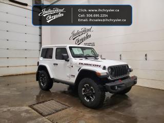 <b>Heavy Duty Suspension,  Climate Control,  Wi-Fi Hotspot,  Tow Equipment,  Fog Lamps!</b><br> <br> <br> <br>  This Jeep Wrangler is the culmination of tireless innovation and extensive testing to build the ultimate off-road SUV! <br> <br>No matter where your next adventure takes you, this Jeep Wrangler is ready for the challenge. With advanced traction and handling capability, sophisticated safety features and ample ground clearance, the Wrangler is designed to climb up and crawl over the toughest terrain. Inside the cabin of this Wrangler offers supportive seats and comes loaded with the technology you expect while staying loyal to the style and design youve come to know and love.<br> <br> This white SUV  has a 8 speed automatic transmission and is powered by a  285HP 3.6L V6 Cylinder Engine.<br> <br> Our Wranglers trim level is Rubicon. Stepping up to this Wrangler Rubicon rewards you with incredible off-roading capability, thanks to heavy duty suspension, class II towing equipment that includes a hitch and trailer sway control, front active and rear anti-roll bars, upfitter switches, locking front and rear differentials, and skid plates for undercarriage protection. Interior features include an 8-speaker Alpine audio system, voice-activated dual zone climate control, front and rear cupholders, and a 12.3-inch infotainment system with smartphone integration and mobile internet hotspot access. Additional features include cruise control, a leatherette-wrapped steering wheel, proximity keyless entry, and even more. This vehicle has been upgraded with the following features: Heavy Duty Suspension,  Climate Control,  Wi-fi Hotspot,  Tow Equipment,  Fog Lamps,  Cruise Control,  Rear Camera. <br><br> View the original window sticker for this vehicle with this url <b><a href=http://www.chrysler.com/hostd/windowsticker/getWindowStickerPdf.do?vin=1C4PJXCG9RW151670 target=_blank>http://www.chrysler.com/hostd/windowsticker/getWindowStickerPdf.do?vin=1C4PJXCG9RW151670</a></b>.<br> <br>To apply right now for financing use this link : <a href=https://www.indianheadchrysler.com/finance/ target=_blank>https://www.indianheadchrysler.com/finance/</a><br><br> <br/> Weve discounted this vehicle $5350. See dealer for details. <br> <br>At Indian Head Chrysler Dodge Jeep Ram Ltd., we treat our customers like family. That is why we have some of the highest reviews in Saskatchewan for a car dealership!  Every used vehicle we sell comes with a limited lifetime warranty on covered components, as long as you keep up to date on all of your recommended maintenance. We even offer exclusive financing rates right at our dealership so you dont have to deal with the banks.
You can find us at 501 Johnston Ave in Indian Head, Saskatchewan-- visible from the TransCanada Highway and only 35 minutes east of Regina. Distance doesnt have to be an issue, ask us about our delivery options!

Call: 306.695.2254<br> Come by and check out our fleet of 30+ used cars and trucks and 70+ new cars and trucks for sale in Indian Head.  o~o
