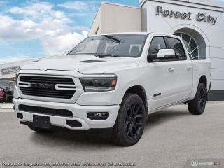 <b>Navigation,  Heated Seats,  4G Wi-Fi,  Heated Steering Wheel,  Forward Collision Alert!</b><br> <br>   Whether you need tough and rugged capability, or soft and comfortable luxury, this 2023 Ram delivers every time. <br> <br>The Ram 1500s unmatched luxury transcends traditional pickups without compromising its capability. Loaded with best-in-class features, its easy to see why the Ram 1500 is so popular. With the most towing and hauling capability in a Ram 1500, as well as improved efficiency and exceptional capability, this truck has the grit to take on any task.<br> <br> This bright white Crew Cab 4X4 pickup   has an automatic transmission and is powered by a  5.7L V8 16V MPFI OHV engine.<br> <br> Our 1500s trim level is Sport. This RAM 1500 Sport throws in some great comforts such as power-adjustable heated front seats with lumbar support, dual-zone climate control, power-adjustable pedals, deluxe sound insulation, and a heated leather-wrapped steering wheel. Connectivity is handled by an upgraded 12-inch display powered by Uconnect 5W with inbuilt navigation, mobile internet hotspot access, smart device integration, and a 10-speaker audio setup. Additional features include power folding exterior mirrors, a power rear window with defrosting, a trailer wiring harness, heavy-duty suspension, cargo box lighting, and a locking tailgate. This vehicle has been upgraded with the following features: Navigation,  Heated Seats,  4g Wi-fi,  Heated Steering Wheel,  Forward Collision Alert,  Climate Control,  Aluminum Wheels. <br><br> View the original window sticker for this vehicle with this url <b><a href=http://www.chrysler.com/hostd/windowsticker/getWindowStickerPdf.do?vin=1C6SRFVT2PN652921 target=_blank>http://www.chrysler.com/hostd/windowsticker/getWindowStickerPdf.do?vin=1C6SRFVT2PN652921</a></b>.<br> <br>To apply right now for financing use this link : <a href=https://www.forestcitydodge.ca/finance-center/ target=_blank>https://www.forestcitydodge.ca/finance-center/</a><br><br> <br/> 6.99% financing for 96 months.  Incentives expire 2023-10-02.  See dealer for details. <br> <br><br> Forest City Dodge proudly serves clients in London ON, St. Thomas ON, Woodstock ON, Tilsonburg ON, Strathroy ON, and the surrounding areas. Formerly known as Southwest Chrysler, Forest City Dodge has become a local automotive leader that takes pride in providing a transparent car buying experience and exceptional customer service throughout the dealership. </br>

<br> If you are looking to finance a vehicle, our finance department are seasoned professionals in ensuring that you get financing options that fits your budget and lifestyle. Regardless of your credit situation, our finance team will work hard to get you approved for a vehicle youre comfortable with in no time. We also offer a dedicated service department thats always ready to attend your needs. Our factory trained technicians will help keep your vehicle in the best shape possible so that your vehicle gets the most out of its lifespan. </br>

<br> We have a strong and committed team with many years of experience satisfying our customers needs. Feel free to browse our inventory online, request more information about our vehicles, or inquire about financing. Visit us today at or contact us now with any questions or concerns! </br>
<br> Come by and check out our fleet of 80+ used cars and trucks and 200+ new cars and trucks for sale in London.  o~o