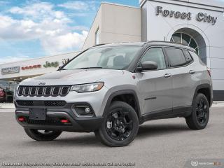<b>Off-Road Package,  Power Liftgate,  Blind Spot Detection,  Leather Seats,  4G Wi-Fi!</b><br> <br>   Elevate your driving experience with this 2023 Jeep Compass, with advanced tech and a slew of great standard features. <br> <br>Keeping with quintessential Jeep engineering, this 2023 Compass sports a striking exterior design, with an extremely refined interior, loaded with the latest and greatest safety, infotainment and convenience technology. This SUV also has the off-road prowess to booth, with rugged build quality and great reliability to ensure that you get to your destination and back, as many times as you want. <br> <br> This silver SUV  has an automatic transmission and is powered by a  2.0L I4 16V GDI DOHC Turbo engine.<br> <br> Our Compasss trim level is Trailhawk. This rugged Compass Trailhawk comes prepped with a comprehensive off-road package that includes beefy suspension, 4 skid plates for undercarriage protection and black aluminum wheels with a full-size under-cargo mounted spare, along with front fog lamps, LED headlights with automatic high beams and cornering function, roof rack rails, and front and rear bumper tow hooks. The standard features continue with heated and power-adjustable front seats with driver lumbar support, a heated steering wheel, cloth/leather seating upholstery, remote engine start, proximity keyless entry, dual-zone front automatic air conditioning, and a 10.1-inch infotainment screen with Apple CarPlay and Android Auto. Safety features also include blind spot detection, forward collision warning with active braking and rear cross-path detection, lane keeping assist with lane departure warning, rear parking sensors, and a rearview camera. This vehicle has been upgraded with the following features: Off-road Package,  Power Liftgate,  Blind Spot Detection,  Leather Seats,  4g Wi-fi,  Heated Steering Wheel,  Remote Start. <br><br> View the original window sticker for this vehicle with this url <b><a href=http://www.chrysler.com/hostd/windowsticker/getWindowStickerPdf.do?vin=3C4NJDDN7PT514392 target=_blank>http://www.chrysler.com/hostd/windowsticker/getWindowStickerPdf.do?vin=3C4NJDDN7PT514392</a></b>.<br> <br>To apply right now for financing use this link : <a href=https://www.forestcitydodge.ca/finance-center/ target=_blank>https://www.forestcitydodge.ca/finance-center/</a><br><br> <br/> Weve discounted this vehicle $999. 6.99% financing for 96 months.  Incentives expire 2023-10-02.  See dealer for details. <br> <br><br> Forest City Dodge proudly serves clients in London ON, St. Thomas ON, Woodstock ON, Tilsonburg ON, Strathroy ON, and the surrounding areas. Formerly known as Southwest Chrysler, Forest City Dodge has become a local automotive leader that takes pride in providing a transparent car buying experience and exceptional customer service throughout the dealership. </br>

<br> If you are looking to finance a vehicle, our finance department are seasoned professionals in ensuring that you get financing options that fits your budget and lifestyle. Regardless of your credit situation, our finance team will work hard to get you approved for a vehicle youre comfortable with in no time. We also offer a dedicated service department thats always ready to attend your needs. Our factory trained technicians will help keep your vehicle in the best shape possible so that your vehicle gets the most out of its lifespan. </br>

<br> We have a strong and committed team with many years of experience satisfying our customers needs. Feel free to browse our inventory online, request more information about our vehicles, or inquire about financing. Visit us today at or contact us now with any questions or concerns! </br>
<br> Come by and check out our fleet of 80+ used cars and trucks and 200+ new cars and trucks for sale in London.  o~o