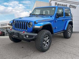 <b>Premium Audio,  Android Auto,  Apple CarPlay,  4G Wi-Fi,  Aluminum Wheels!</b><br> <br>   Whether youre concurring a highway mountain pass or challenging off-road trail, this reliable Jeep Wrangler is ready to get you there with style. <br> <br>No matter where your next adventure takes you, this Jeep Wrangler is ready for the challenge. With advanced traction and handling capability, sophisticated safety features and ample ground clearance, the Wrangler is designed to climb up and crawl over the toughest terrain. Inside the cabin of this Wrangler offers supportive seats and comes loaded with the technology you expect while staying loyal to the style and design youve come to know and love.<br> <br> This blue SUV  has an automatic transmission and is powered by a  3.6L V6 24V MPFI DOHC engine.<br> <br> Our Wranglers trim level is Rubicon. This Rubicon Wrangler is more than a cool hood decal with electronic locking axles, electronic sway bar disconnect, a Rock-Trac 4x4 system, Off Road Plus Mode, and performance suspension built for giant 33-inch tires. On top of this is a heavily upgraded infotainment system with navigation, the Alpine Premium Audio System, wi-fi, Apple CarPlay, and Android Auto. This off-road machine also comes with skid plates, tow hooks, a sport bar, aluminum wheels, and Dana axles. A rear view camera and fog lamps help you stay safe whether you are on the road or way off in the sticks. This vehicle has been upgraded with the following features: Premium Audio,  Android Auto,  Apple Carplay,  4g Wi-fi,  Aluminum Wheels,  Rear Camera,  Off-road Suspension. <br><br> View the original window sticker for this vehicle with this url <b><a href=http://www.chrysler.com/hostd/windowsticker/getWindowStickerPdf.do?vin=1C4HJXCGXPW664377 target=_blank>http://www.chrysler.com/hostd/windowsticker/getWindowStickerPdf.do?vin=1C4HJXCGXPW664377</a></b>.<br> <br>To apply right now for financing use this link : <a href=https://www.forestcitydodge.ca/finance-center/ target=_blank>https://www.forestcitydodge.ca/finance-center/</a><br><br> <br/> Weve discounted this vehicle $907. 6.99% financing for 96 months.  Incentives expire 2023-10-02.  See dealer for details. <br> <br><br> Forest City Dodge proudly serves clients in London ON, St. Thomas ON, Woodstock ON, Tilsonburg ON, Strathroy ON, and the surrounding areas. Formerly known as Southwest Chrysler, Forest City Dodge has become a local automotive leader that takes pride in providing a transparent car buying experience and exceptional customer service throughout the dealership. </br>

<br> If you are looking to finance a vehicle, our finance department are seasoned professionals in ensuring that you get financing options that fits your budget and lifestyle. Regardless of your credit situation, our finance team will work hard to get you approved for a vehicle youre comfortable with in no time. We also offer a dedicated service department thats always ready to attend your needs. Our factory trained technicians will help keep your vehicle in the best shape possible so that your vehicle gets the most out of its lifespan. </br>

<br> We have a strong and committed team with many years of experience satisfying our customers needs. Feel free to browse our inventory online, request more information about our vehicles, or inquire about financing. Visit us today at or contact us now with any questions or concerns! </br>
<br> Come by and check out our fleet of 80+ used cars and trucks and 200+ new cars and trucks for sale in London.  o~o