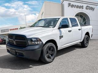 <b>Heavy Duty Suspension,  Tow Package,  Power Mirrors,  Rear Camera!</b><br> <br>   This Ram 1500 Classic is a top contender in the full-size pickup segment thanks to a winning combination of a strong powertrain, a smooth ride and a well-trimmed cabin. <br> <br>The reasons why this Ram 1500 Classic stands above its well-respected competition are evident: uncompromising capability, proven commitment to safety and security, and state-of-the-art technology. From its muscular exterior to the well-trimmed interior, this 2023 Ram 1500 Classic is more than just a workhorse. Get the job done in comfort and style while getting a great value with this amazing full-size truck. <br> <br> This bright white Crew Cab 4X4 pickup   has an automatic transmission and is powered by a  3.6L V6 24V MPFI DOHC engine.<br> <br> Our 1500 Classics trim level is Tradesman. This Ram 1500 Tradesman is ready for whatever you throw at it, with a great selection of standard features such as class II towing equipment including a hitch, wiring harness and trailer sway control, heavy-duty suspension, cargo box lighting, and a locking tailgate. Additional features include heated and power adjustable side mirrors, UCconnect 3, cruise control, air conditioning, vinyl floor lining, and a rearview camera. This vehicle has been upgraded with the following features: Heavy Duty Suspension,  Tow Package,  Power Mirrors,  Rear Camera. <br><br> View the original window sticker for this vehicle with this url <b><a href=http://www.chrysler.com/hostd/windowsticker/getWindowStickerPdf.do?vin=1C6RR7KG7PS552813 target=_blank>http://www.chrysler.com/hostd/windowsticker/getWindowStickerPdf.do?vin=1C6RR7KG7PS552813</a></b>.<br> <br>To apply right now for financing use this link : <a href=https://www.forestcitydodge.ca/finance-center/ target=_blank>https://www.forestcitydodge.ca/finance-center/</a><br><br> <br/> Weve discounted this vehicle $970. 6.99% financing for 96 months.  Incentives expire 2023-10-02.  See dealer for details. <br> <br><br> Forest City Dodge proudly serves clients in London ON, St. Thomas ON, Woodstock ON, Tilsonburg ON, Strathroy ON, and the surrounding areas. Formerly known as Southwest Chrysler, Forest City Dodge has become a local automotive leader that takes pride in providing a transparent car buying experience and exceptional customer service throughout the dealership. </br>

<br> If you are looking to finance a vehicle, our finance department are seasoned professionals in ensuring that you get financing options that fits your budget and lifestyle. Regardless of your credit situation, our finance team will work hard to get you approved for a vehicle youre comfortable with in no time. We also offer a dedicated service department thats always ready to attend your needs. Our factory trained technicians will help keep your vehicle in the best shape possible so that your vehicle gets the most out of its lifespan. </br>

<br> We have a strong and committed team with many years of experience satisfying our customers needs. Feel free to browse our inventory online, request more information about our vehicles, or inquire about financing. Visit us today at or contact us now with any questions or concerns! </br>
<br> Come by and check out our fleet of 80+ used cars and trucks and 200+ new cars and trucks for sale in London.  o~o