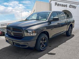 <b>Heavy Duty Suspension,  Tow Package,  Power Mirrors,  Rear Camera!</b><br> <br>   This Ram 1500 Classic is a top contender in the full-size pickup segment thanks to a winning combination of a strong powertrain, a smooth ride and a well-trimmed cabin. <br> <br>The reasons why this Ram 1500 Classic stands above its well-respected competition are evident: uncompromising capability, proven commitment to safety and security, and state-of-the-art technology. From its muscular exterior to the well-trimmed interior, this 2023 Ram 1500 Classic is more than just a workhorse. Get the job done in comfort and style while getting a great value with this amazing full-size truck. <br> <br> This granite Crew Cab 4X4 pickup   has an automatic transmission and is powered by a  3.6L V6 24V MPFI DOHC engine.<br> <br> Our 1500 Classics trim level is Tradesman. This Ram 1500 Tradesman is ready for whatever you throw at it, with a great selection of standard features such as class II towing equipment including a hitch, wiring harness and trailer sway control, heavy-duty suspension, cargo box lighting, and a locking tailgate. Additional features include heated and power adjustable side mirrors, UCconnect 3, cruise control, air conditioning, vinyl floor lining, and a rearview camera. This vehicle has been upgraded with the following features: Heavy Duty Suspension,  Tow Package,  Power Mirrors,  Rear Camera. <br><br> View the original window sticker for this vehicle with this url <b><a href=http://www.chrysler.com/hostd/windowsticker/getWindowStickerPdf.do?vin=1C6RR7KGXPS542440 target=_blank>http://www.chrysler.com/hostd/windowsticker/getWindowStickerPdf.do?vin=1C6RR7KGXPS542440</a></b>.<br> <br>To apply right now for financing use this link : <a href=https://www.forestcitydodge.ca/finance-center/ target=_blank>https://www.forestcitydodge.ca/finance-center/</a><br><br> <br/> Weve discounted this vehicle $970. 6.99% financing for 96 months.  Incentives expire 2023-10-02.  See dealer for details. <br> <br><br> Forest City Dodge proudly serves clients in London ON, St. Thomas ON, Woodstock ON, Tilsonburg ON, Strathroy ON, and the surrounding areas. Formerly known as Southwest Chrysler, Forest City Dodge has become a local automotive leader that takes pride in providing a transparent car buying experience and exceptional customer service throughout the dealership. </br>

<br> If you are looking to finance a vehicle, our finance department are seasoned professionals in ensuring that you get financing options that fits your budget and lifestyle. Regardless of your credit situation, our finance team will work hard to get you approved for a vehicle youre comfortable with in no time. We also offer a dedicated service department thats always ready to attend your needs. Our factory trained technicians will help keep your vehicle in the best shape possible so that your vehicle gets the most out of its lifespan. </br>

<br> We have a strong and committed team with many years of experience satisfying our customers needs. Feel free to browse our inventory online, request more information about our vehicles, or inquire about financing. Visit us today at or contact us now with any questions or concerns! </br>
<br> Come by and check out our fleet of 80+ used cars and trucks and 200+ new cars and trucks for sale in London.  o~o
