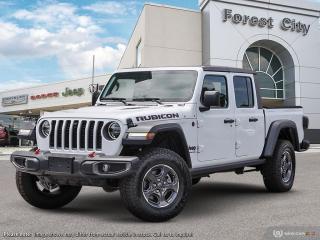<b>Heavy Duty Suspension,  Sunroof,  Premium Audio,  Navigation,  Climate Control!</b><br> <br>   This Jeep Gladiator is ready to change the game of utility vehicles and pickup trucks. <br> <br>Built with unmistakable Jeep styling and off-road capability and the capability and hauling power of a pickup truck, you get the best of both worlds with this incredible machine. Thanks to its unmistakable style, rugged off-road technology, and an exhilarating open air truck experience, this unique Jeep Gladiator is ready to change the 4X4 game.<br> <br> This bright white Regular Cab 4X4 pickup   has an automatic transmission and is powered by a  3.6L V6 24V MPFI DOHC engine.<br> <br> Our Gladiators trim level is Rubicon. Sitting at the top of the Gladiator range, this Rubicon trim is fully loaded with FOX premium dampers, 7 skid plates, heavy-duty suspension, a manual Targa composite first-row sunroof, a 9-speaker Alpine premium audio setup, voice-activated navigation, dual-zone climate control, class III towing equipment with a trailer wiring harness and trailer sway control, a full-size spare with underbody storage, removable doors and windows, and a manual convertible top with fixed roll-over protection. This rugged truck also features great convenience features like proximity keyless entry with push button start, illuminated front and rear cupholders, two 12-volt DC and a 120-volt AC power outlets, and tons of storage space. Handling infotainment and connectivity duties is an 8.4-inch screen powered by Uconnect 4, and features Apple CarPlay, Android Auto, 4G LTE WiFi hotspot internet access, and streaming audio. This vehicle has been upgraded with the following features: Heavy Duty Suspension,  Sunroof,  Premium Audio,  Navigation,  Climate Control,  Apple Carplay,  Android Auto. <br><br> View the original window sticker for this vehicle with this url <b><a href=http://www.chrysler.com/hostd/windowsticker/getWindowStickerPdf.do?vin=1C6JJTBG2PL520102 target=_blank>http://www.chrysler.com/hostd/windowsticker/getWindowStickerPdf.do?vin=1C6JJTBG2PL520102</a></b>.<br> <br>To apply right now for financing use this link : <a href=https://www.forestcitydodge.ca/finance-center/ target=_blank>https://www.forestcitydodge.ca/finance-center/</a><br><br> <br/> Weve discounted this vehicle $1607. 6.99% financing for 96 months.  Incentives expire 2023-10-02.  See dealer for details. <br> <br><br> Forest City Dodge proudly serves clients in London ON, St. Thomas ON, Woodstock ON, Tilsonburg ON, Strathroy ON, and the surrounding areas. Formerly known as Southwest Chrysler, Forest City Dodge has become a local automotive leader that takes pride in providing a transparent car buying experience and exceptional customer service throughout the dealership. </br>

<br> If you are looking to finance a vehicle, our finance department are seasoned professionals in ensuring that you get financing options that fits your budget and lifestyle. Regardless of your credit situation, our finance team will work hard to get you approved for a vehicle youre comfortable with in no time. We also offer a dedicated service department thats always ready to attend your needs. Our factory trained technicians will help keep your vehicle in the best shape possible so that your vehicle gets the most out of its lifespan. </br>

<br> We have a strong and committed team with many years of experience satisfying our customers needs. Feel free to browse our inventory online, request more information about our vehicles, or inquire about financing. Visit us today at or contact us now with any questions or concerns! </br>
<br> Come by and check out our fleet of 80+ used cars and trucks and 200+ new cars and trucks for sale in London.  o~o