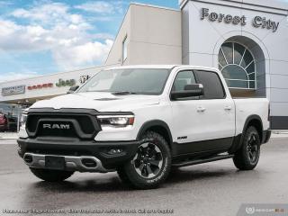 <b>Off-Road Suspension,  SiriusXM,  Apple CarPlay,  Android Auto,  Navigation!</b><br> <br>   Work, play, and adventure are what the 2023 Ram 1500 was designed to do. <br> <br>The Ram 1500s unmatched luxury transcends traditional pickups without compromising its capability. Loaded with best-in-class features, its easy to see why the Ram 1500 is so popular. With the most towing and hauling capability in a Ram 1500, as well as improved efficiency and exceptional capability, this truck has the grit to take on any task.<br> <br> This bright white Crew Cab 4X4 pickup   has an automatic transmission and is powered by a  5.7L V8 16V MPFI OHV engine.<br> <br> Our 1500s trim level is Rebel. Bold and unapologetic, this Ram 1500 Rebel features beefy off-road suspension including Bilstein dampers, skid plates for underbody protection, gloss black wheels, front fog lamps, power-folding exterior mirrors with courtesy lamps, and black fender flares, with front bumper tow hooks. The standard features continue, with power-adjustable heated front seats with lumbar support, dual-zone climate control, power-adjustable pedals, deluxe sound insulation, and a leather-wrapped steering wheel. Connectivity is handled by an upgraded 8.4-inch display powered by Uconnect 5 with inbuilt navigation, mobile internet hotspot access, Apple CarPlay, Android Auto and SiriusXM streaming radio. Additional features include a power rear window with defrosting, class II towing equipment including a hitch, wiring harness and trailer sway control, heavy-duty suspension, cargo box lighting, and a locking tailgate. This vehicle has been upgraded with the following features: Off-road Suspension,  Siriusxm,  Apple Carplay,  Android Auto,  Navigation,  Heated Seats,  4g Wi-fi. <br><br> View the original window sticker for this vehicle with this url <b><a href=http://www.chrysler.com/hostd/windowsticker/getWindowStickerPdf.do?vin=1C6SRFLT4PN531021 target=_blank>http://www.chrysler.com/hostd/windowsticker/getWindowStickerPdf.do?vin=1C6SRFLT4PN531021</a></b>.<br> <br>To apply right now for financing use this link : <a href=https://www.forestcitydodge.ca/finance-center/ target=_blank>https://www.forestcitydodge.ca/finance-center/</a><br><br> <br/> 6.99% financing for 96 months.  Incentives expire 2023-10-02.  See dealer for details. <br> <br><br> Forest City Dodge proudly serves clients in London ON, St. Thomas ON, Woodstock ON, Tilsonburg ON, Strathroy ON, and the surrounding areas. Formerly known as Southwest Chrysler, Forest City Dodge has become a local automotive leader that takes pride in providing a transparent car buying experience and exceptional customer service throughout the dealership. </br>

<br> If you are looking to finance a vehicle, our finance department are seasoned professionals in ensuring that you get financing options that fits your budget and lifestyle. Regardless of your credit situation, our finance team will work hard to get you approved for a vehicle youre comfortable with in no time. We also offer a dedicated service department thats always ready to attend your needs. Our factory trained technicians will help keep your vehicle in the best shape possible so that your vehicle gets the most out of its lifespan. </br>

<br> We have a strong and committed team with many years of experience satisfying our customers needs. Feel free to browse our inventory online, request more information about our vehicles, or inquire about financing. Visit us today at or contact us now with any questions or concerns! </br>
<br> Come by and check out our fleet of 80+ used cars and trucks and 200+ new cars and trucks for sale in London.  o~o