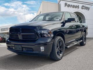 <b>Aluminum Wheels,  Proximity Key,  Heavy Duty Suspension,  Tow Package,  Power Mirrors!</b><br> <br>   Reliable, dependable, and innovative, this Ram 1500 Classic proves that it has what it takes to get the job done right. <br> <br>The reasons why this Ram 1500 Classic stands above its well-respected competition are evident: uncompromising capability, proven commitment to safety and security, and state-of-the-art technology. From its muscular exterior to the well-trimmed interior, this 2023 Ram 1500 Classic is more than just a workhorse. Get the job done in comfort and style while getting a great value with this amazing full-size truck. <br> <br> This black Crew Cab 4X4 pickup   has an automatic transmission and is powered by a  5.7L V8 16V MPFI OHV engine.<br> <br> Our 1500 Classics trim level is SLT. This Ram 1500 SLT steps things up with upgraded aluminum wheels, proximity keyless entry, USB connectivity and exterior chrome styling, along with a great selection of standard features such as class II towing equipment including a hitch, wiring harness and trailer sway control, heavy-duty suspension, cargo box lighting, and a locking tailgate. Additional features include heated and power adjustable side mirrors, UCconnect 3, cruise control, air conditioning, vinyl floor lining, and a rearview camera. This vehicle has been upgraded with the following features: Aluminum Wheels,  Proximity Key,  Heavy Duty Suspension,  Tow Package,  Power Mirrors,  Rear Camera. <br><br> View the original window sticker for this vehicle with this url <b><a href=http://www.chrysler.com/hostd/windowsticker/getWindowStickerPdf.do?vin=1C6RR7LTXPS555569 target=_blank>http://www.chrysler.com/hostd/windowsticker/getWindowStickerPdf.do?vin=1C6RR7LTXPS555569</a></b>.<br> <br>To apply right now for financing use this link : <a href=https://www.forestcitydodge.ca/finance-center/ target=_blank>https://www.forestcitydodge.ca/finance-center/</a><br><br> <br/> Weve discounted this vehicle $970. 6.99% financing for 96 months.  Incentives expire 2023-10-02.  See dealer for details. <br> <br><br> Forest City Dodge proudly serves clients in London ON, St. Thomas ON, Woodstock ON, Tilsonburg ON, Strathroy ON, and the surrounding areas. Formerly known as Southwest Chrysler, Forest City Dodge has become a local automotive leader that takes pride in providing a transparent car buying experience and exceptional customer service throughout the dealership. </br>

<br> If you are looking to finance a vehicle, our finance department are seasoned professionals in ensuring that you get financing options that fits your budget and lifestyle. Regardless of your credit situation, our finance team will work hard to get you approved for a vehicle youre comfortable with in no time. We also offer a dedicated service department thats always ready to attend your needs. Our factory trained technicians will help keep your vehicle in the best shape possible so that your vehicle gets the most out of its lifespan. </br>

<br> We have a strong and committed team with many years of experience satisfying our customers needs. Feel free to browse our inventory online, request more information about our vehicles, or inquire about financing. Visit us today at or contact us now with any questions or concerns! </br>
<br> Come by and check out our fleet of 80+ used cars and trucks and 200+ new cars and trucks for sale in London.  o~o