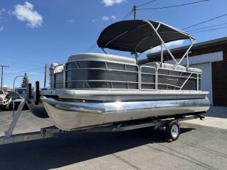 ***Financing Available*** Free delivery within 150 kms!! Amazing end of season price!!

ONLY 79.7 HOURS!! HIGH END GODFREY SWEETWATER 21-FT PONTOON W/ MERCURY FOUR STROKE 60HP COMMAND THRUST ENGINE! Grey canopy with bimini top, travel and storage tarp, upgraded lunar gray luxe vinyl, Marine Audio Radio with Bluetooth, Lowrance hook 3x fish finder, folding aluminum ladder, upgraded Faria gauges, full harbor grey deck, adjustable captains chair (up and down), wood grain trim dashboard, carbon grey wrapped vinyl seat boxes and loads of underseat storage!

Trailer available