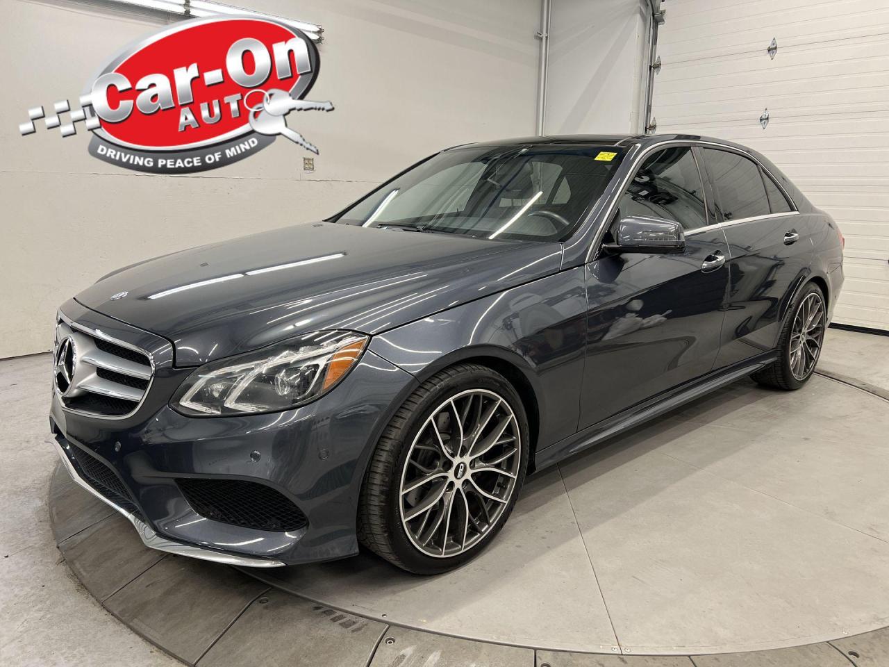 ONLY 77,000 KMS!! E350 4MATIC W/ PREMIUM PKG, DRIVING ASSISTANCE PKG AND LED LIGHTING SYSTEM INL. BACKUP/360 CAMERAS W/ FRONT & REAR PARK SENSORS, PANORAMIC SUNROOF, FRONT & REAR HEATED SEATS, BLIND SPOT MONITOR, LANE KEEP ASSIST, NAVIGATION AND HARMAN/KARDON AUDIO!! 19-in alloys, heated steering, 302HP V6, rear sunshade, dual-zone climate control, paddle shifters, auto headlights w/ auto highbeams, full power group incl. power seats w/ driver memory, power trunk, garage door opener, cruise control and Sirius XM!