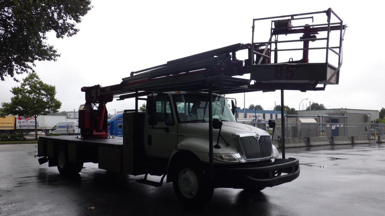 Used 2010 International 4300 Durastar  Bucket Flat Deck Truck 3 Seater Diesel for sale in Burnaby, BC