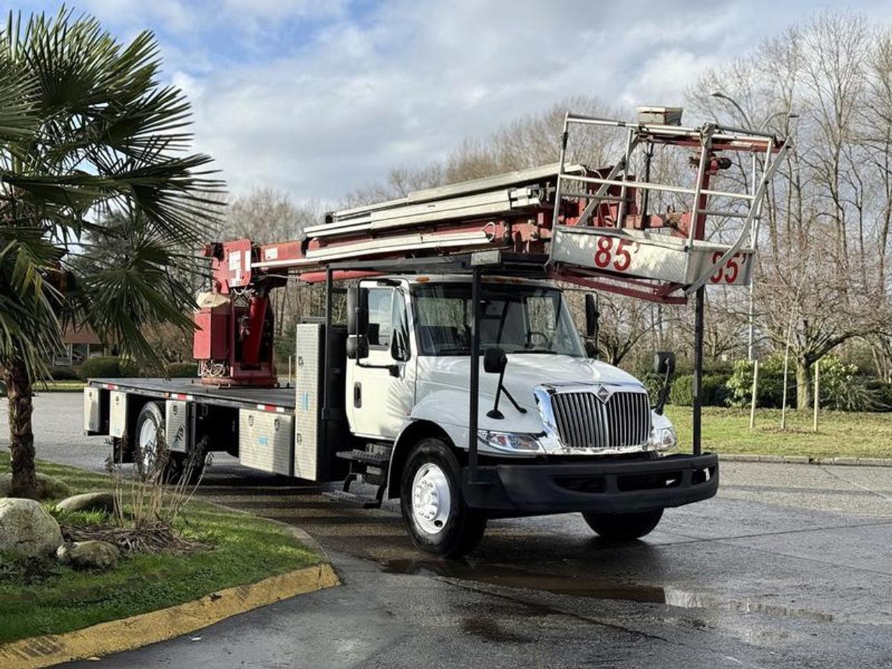 The 2010 International 4300 Durastar Bucket Flat Deck Truck is a diesel-powered commercial work truck built for aerial service and utility applications, equipped with a 7.6L MaxxForce inline-6 diesel engine, automatic transmission, and 4x2 drivetrain. This unit features a bucket lift mounted on a flat deck configuration with integrated storage compartments, offering a practical platform for electrical, signage, telecom, and maintenance work. The cab seats up to three and includes cruise control and an AM/FM radio, while the flat deck measures approximately 23.5 feet in length and 8 feet in width, providing ample working space and stability. Finished in white with a grey vinyl interior, this International 4300 bucket truck is well suited for commercial fleets requiring reach, utility, and durability in a versatile service vehicle. Certificate and decal valid to December 2026 This item is currently OFFSITE. You must register an appointment with our office to schedule an offsite viewing. Appointments must be made a minimum of one business day in advance (and as defined by the days that Repo.com is open for business) before your appointment can be scheduled and confirmed. We may, at our own discretion, instead opt to transport smaller items to Repo.coms main yard for viewing purposes.  $32,810.00 plus $375 processing fee, $33,185.00 total payment obligation before taxes.   Listing report, warranty, contract commitment cancellation fee, financing available on approved credit (some limitations and exceptions may apply). All above specifications and information is considered to be accurate but is not guaranteed and no opinion or advice is given as to whether this item should be purchased. We do not allow test drives due to theft, fraud, acts of vandalism and undetectable impaired driving. Instead we provide the following benefits: Complimentary Warranty (with options to extend), Limited Money Back Satisfaction Guarantee on Fully Completed Contracts, Contract Commitment Cancellation, and an Open-Ended Sell-Back Option. Ask seller for details or call 604-522-REPO(7376) to confirm listing availability.