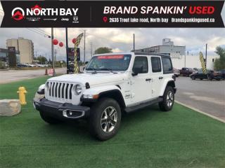 <b>Certified, Low Mileage, Heavy Duty Suspension,  4G Wi-Fi,  Android Auto,  Apple CarPlay,  Navigation!</b><br> <br> <b>Out of town? We will pay your gas to get here! Ask us for details!</b><br><br> <br>LOCAL TRADE! Certified. 17,962km below market average! Meticulously maintained off-road SUV that combines rugged capability, iconic style, and modern technology, ready to transform your every journey into an unforgettable exploration! Fully inspected and reconditioned for years of driving enjoyment!<br><br>8 Speakers, Apple CarPlay/Android Auto, Automatic temperature control, Black Premium Sunrider Soft Top, Cloth Bucket Seats w/Sahara Logo, Convertible HardTop, Dual Top Group, Front fog lights, Heated door mirrors, Leather steering wheel, ParkView Rear Back-Up Camera, Quick Order Package 23G Sahara, Radio: Uconnect 4 w/7 Display, Remote keyless entry, Split folding rear seat, Wheels: 18 x 7.5 Aluminum w/Granite Crystal. Dual tops *Manual trans* 4WD 6-Speed Manual Pentastar 3.6L V6 VVT<br><br>At North Bay Chrysler we pride ourselves on providing a personalized experience for each of our valued customers. We offer a wide selection of vehicles, knowledgeable sales and service staff, complete service and parts centre, and competitive all in pricing with no hidden fees or charges! We look forward to seeing you soon.<br><br>*Prices include a $2000 finance credit. Cash Purchases are subject to change. Every reasonable effort is made to ensure the accuracy of the information listed above, but errors happen. We reserve the right to change or amend these offers. The vehicle pricing, incentives, options (including standard equipment), and technical specifications listed, may not match the exact vehicle displayed. All finance pricing listed is O.A.C (on approved credit). Please confirm with a sales representative the accuracy of this information and pricing.<br> To view the original window sticker for this vehicle view this <a href=http://www.chrysler.com/hostd/windowsticker/getWindowStickerPdf.do?vin=1C4HJXEG0MW864497 target=_blank>http://www.chrysler.com/hostd/windowsticker/getWindowStickerPdf.do?vin=1C4HJXEG0MW864497</a>. <br/><br> <br/><br> Buy this vehicle now for the lowest bi-weekly payment of <b>$281.68</b> with $4222 down for 84 months @ 8.99% APR O.A.C. ( Plus applicable taxes -  platinum security included  / Total cost of borrowing $13266   ).  See dealer for details. <br> <br>All in price - No hidden fees or charges! o~o
