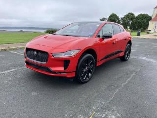 The 2022 Jaguar I-PACE HSE is a remarkable achievement in the world of electric vehicles, seamlessly blending luxury, performance, and eco-friendliness. From the moment you set eyes on its sleek and aerodynamic design, its clear that this is not just an ordinary SUV, but a testament to Jaguars commitment to innovation.Under the hood, or should I say beneath the cabin floor, the I-PACE HSE boasts a powerful all-electric drivetrain that delivers instantaneous acceleration and a whisper-quiet ride. The dual electric motors---one at the front and one at the rear---combine to produce an impressive amount of torque, translating to thrilling bursts of speed that rival many traditional sports cars. Whether youre merging onto the highway or navigating urban streets, the I-PACE HSE responds with a sense of urgency that puts a smile on your face every time you press the accelerator.Step inside the cabin, and youre immediately enveloped in an atmosphere of opulence and modernity. High-quality materials, meticulous craftsmanship, and cutting-edge technology converge to create an interior thats both aesthetically pleasing and functional. The dual touchscreen infotainment system is a marvel, providing intuitive controls for everything from navigation and entertainment to climate settings and vehicle diagnostics. Apple CarPlay and Android Auto integration ensure that youre always seamlessly connected, while the Meridian sound system fills the cabin with rich, immersive audio.One of the standout features of the I-PACE HSE is its exceptional range. Thanks to its advanced battery technology and efficient regenerative braking system, youll find yourself covering impressive distances before needing to recharge. This not only eliminates range anxiety but also underscores Jaguars commitment to sustainability and reducing the carbon footprint.Handling is where the I-PACE HSE truly shines. Despite its SUV classification, it boasts the agility and precision of a much smaller vehicle. The low center of gravity, balanced weight distribution, and adaptive air suspension combine to deliver a remarkably smooth and composed ride, even on challenging road surfaces. Whether youre tackling tight corners or cruising on the open road, the I-PACE HSEs dynamic handling instills a sense of confidence thats hard to match.In conclusion, the 2022 Jaguar I-PACE HSE is a triumph of electric vehicle engineering that seamlessly marries luxury, performance, and environmental consciousness. Its breathtaking design, exhilarating acceleration, top-tier interior, impressive range, and exceptional handling set it apart as a leader in the EV market. For those seeking a forward-thinking and thrilling driving experience, the I-PACE HSE proves that eco-friendly doesnt have to mean compromising on style or excitement.